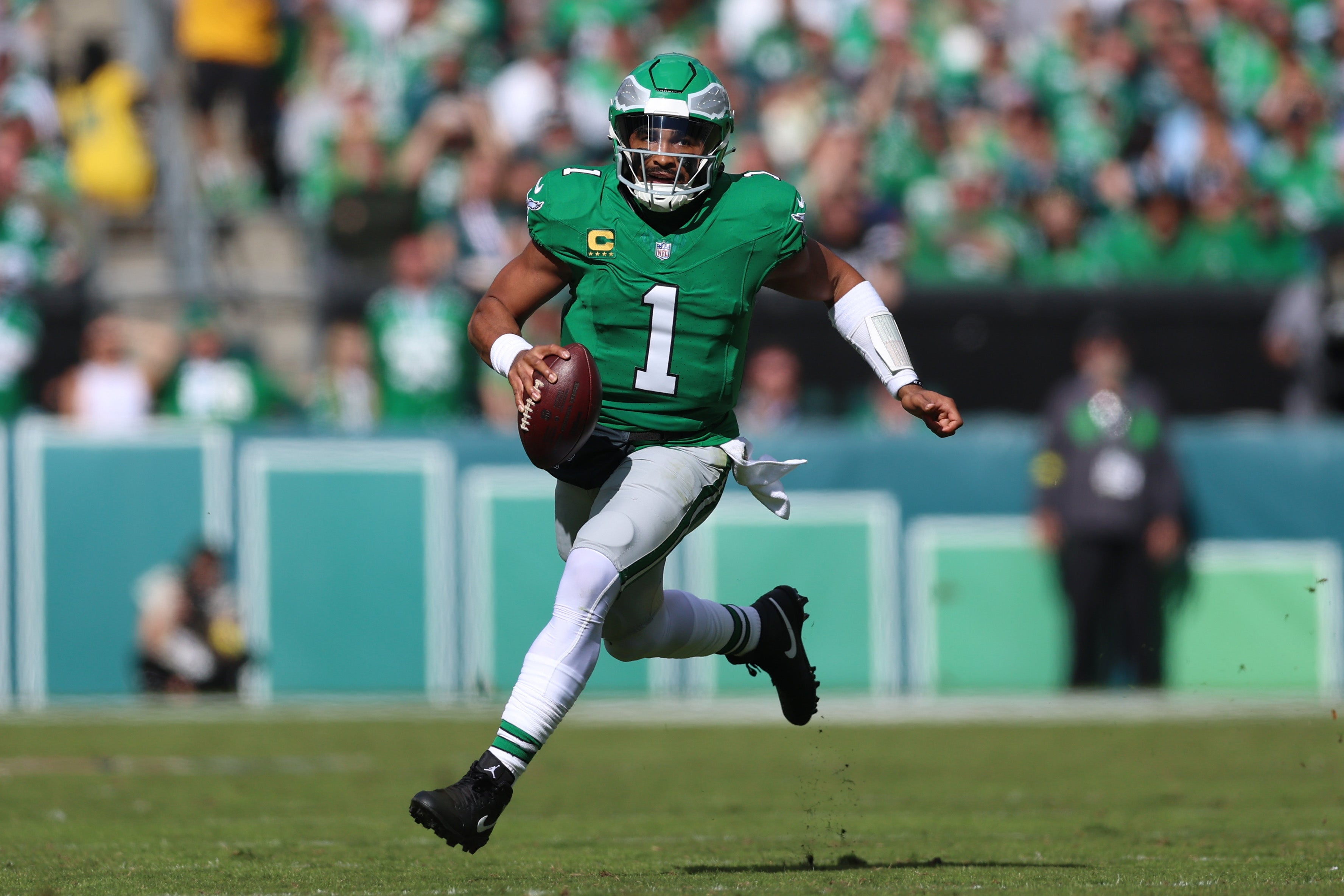 Philadelphia Eagles quarterback Jalen Hurts (1) runs against the New York Giants in the first quarter at Lincoln Financial Field.