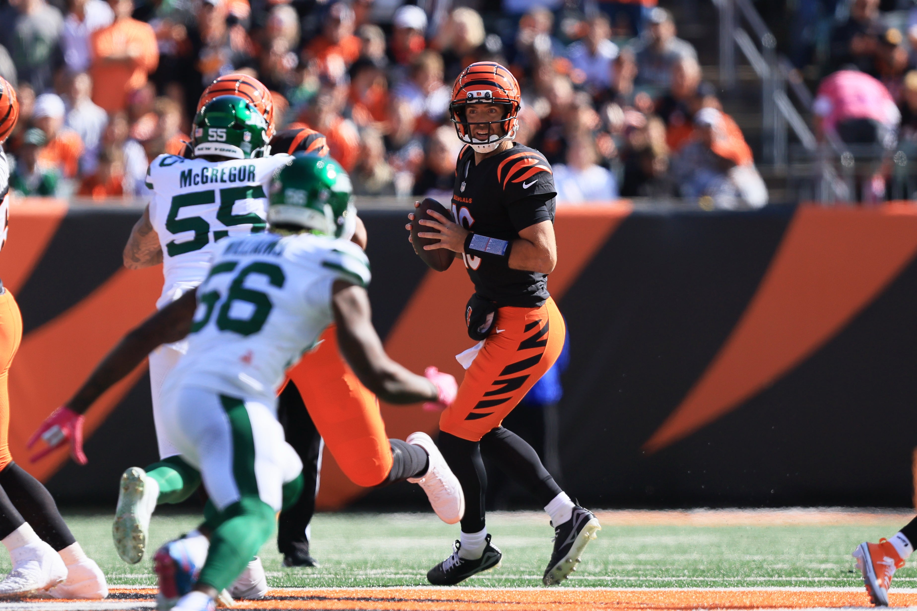 Oct 26, 2025; Cincinnati, Ohio, USA; Cincinnati Bengals quarterback Joe Flacco (16) looks to pass the ball during the game against the New York Jets during the first quarter at Paycor Stadium.