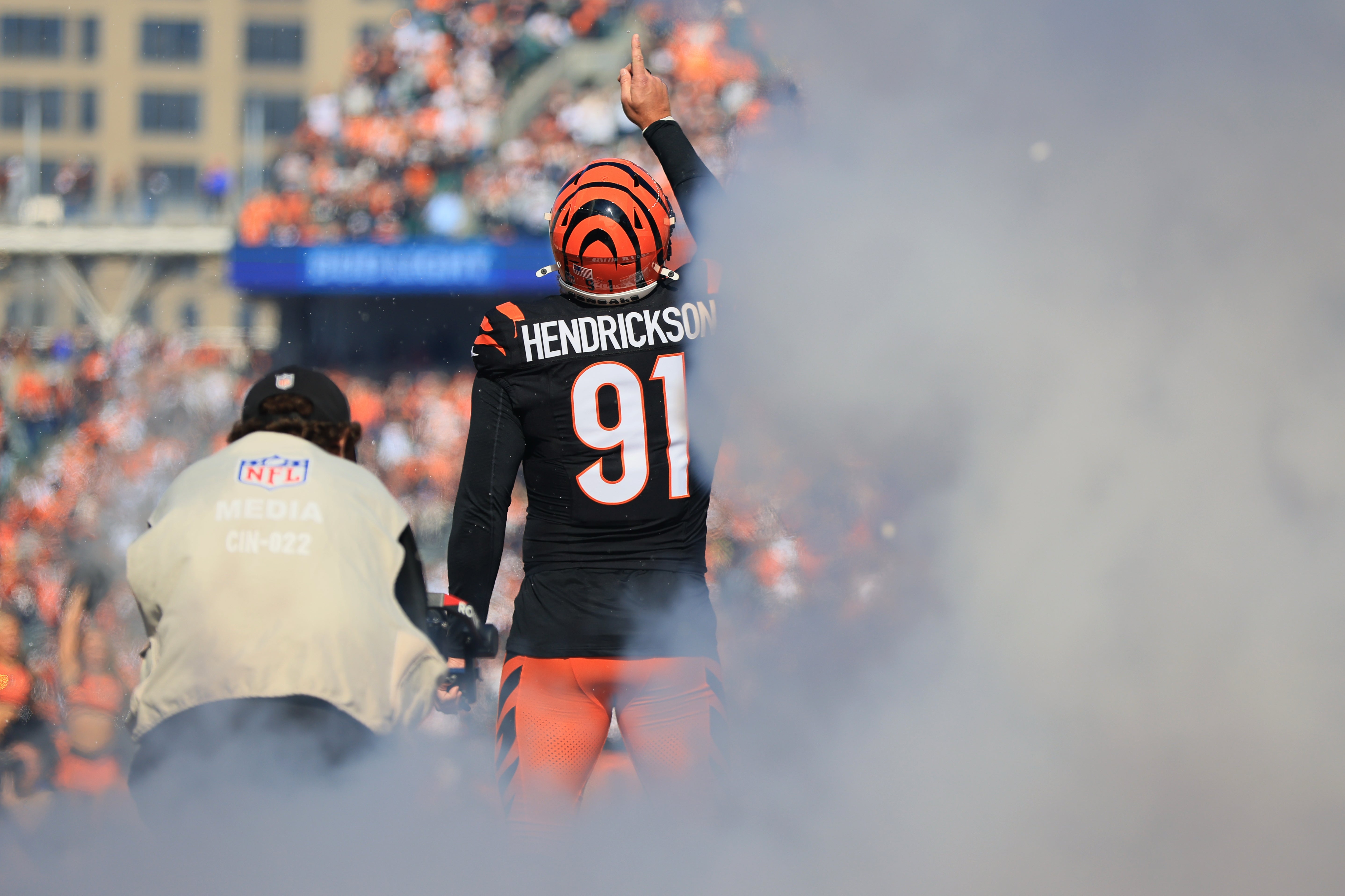 Oct 26, 2025; Cincinnati, Ohio, USA; Cincinnati Bengals defensive end Trey Hendrickson (91) runs out to the field before the game against the New York Jets at Paycor Stadium.