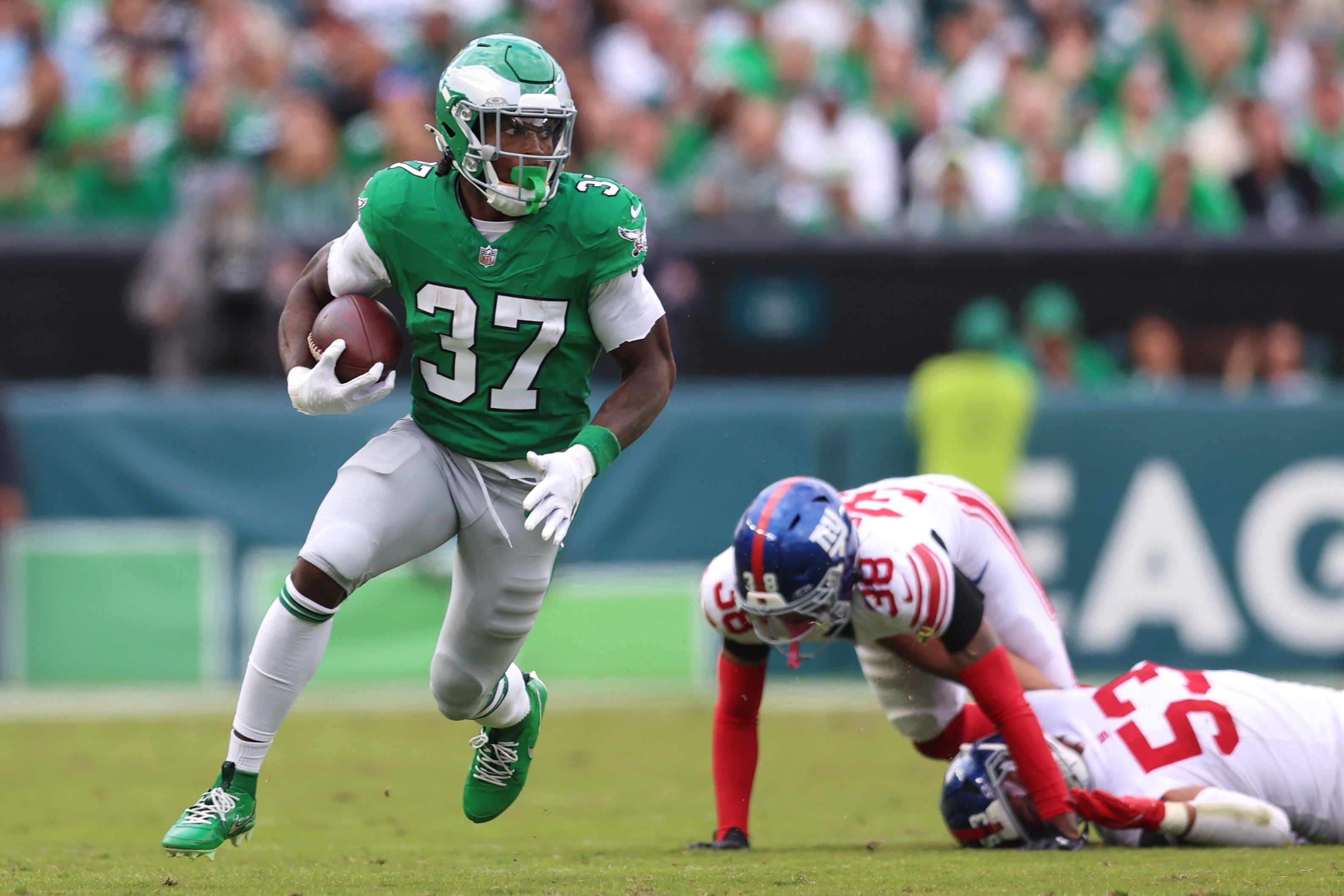 Philadelphia Eagles running back Tank Bigsby (37) runs against the New York Giants during the fourth quarter at Lincoln Financial Field.