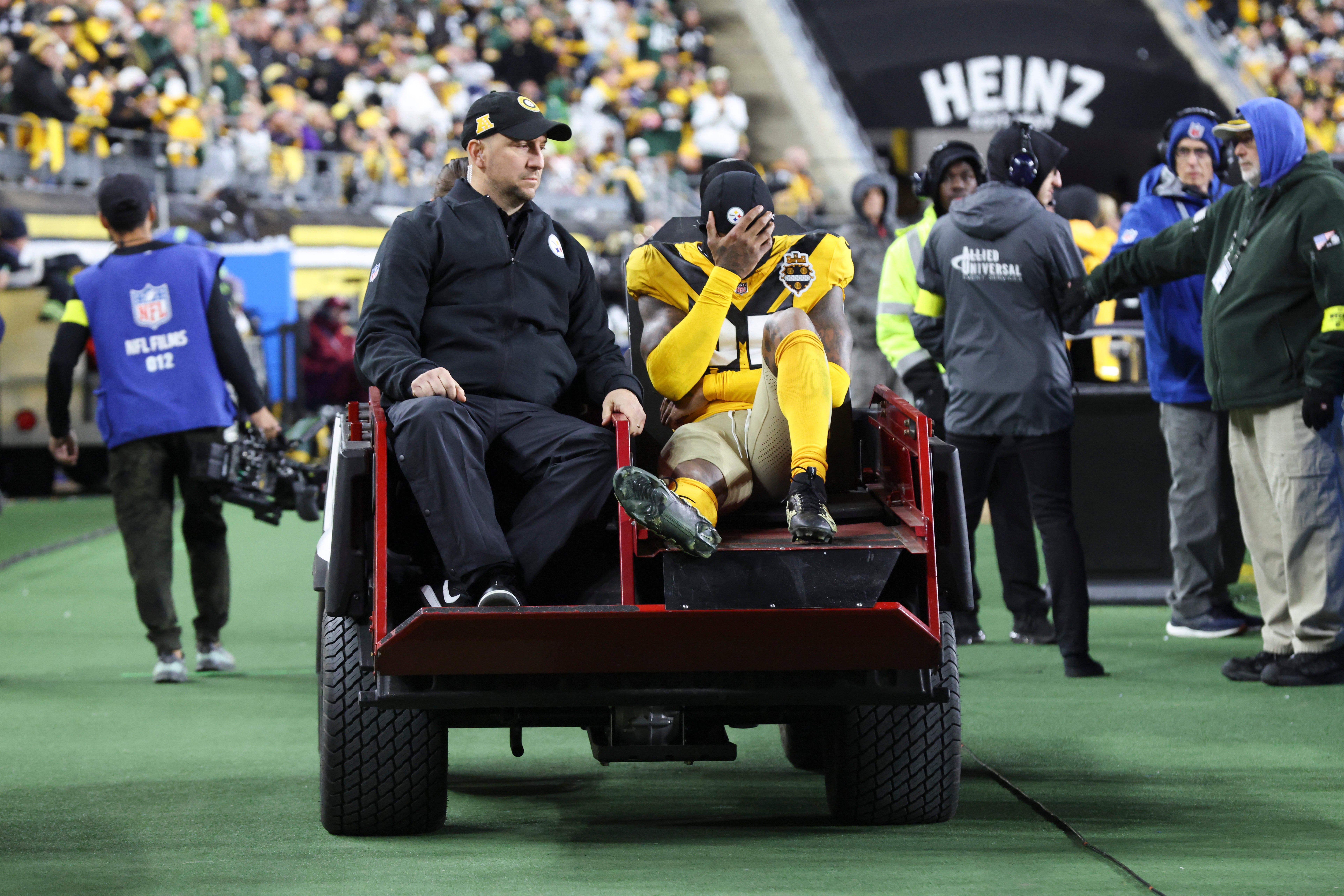 Oct 26, 2025; Pittsburgh, Pennsylvania, USA; Pittsburgh Steelers safety DeShon Elliott (25) is carted off after a third quarter injury against the Green Bay Packers at Acrisure Stadium.