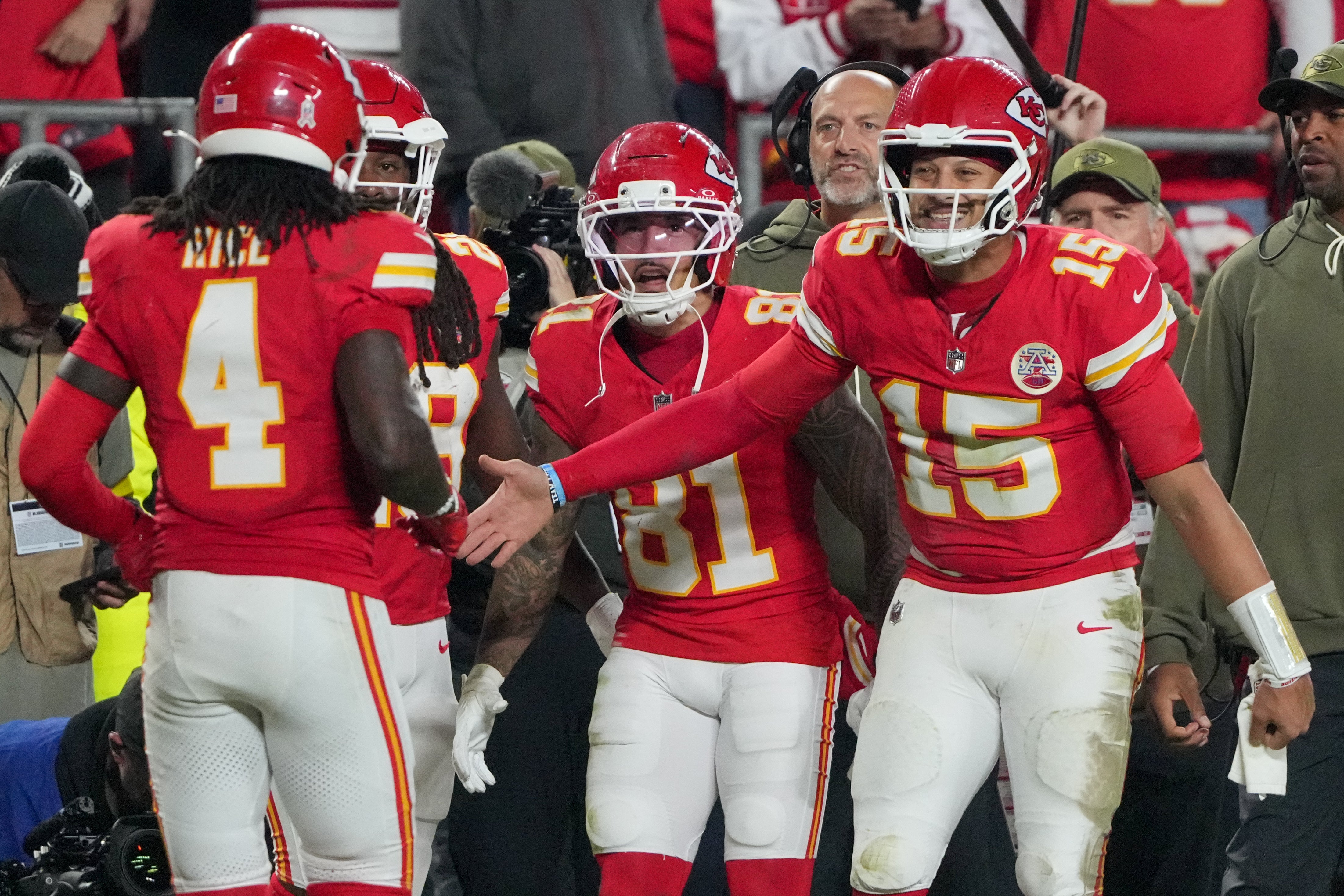 Kansas City Chiefs wide receiver Rashee Rice (4) celebrates after scoring a touchdown against the Washington Commanders with quarterback Patrick Mahomes (15)