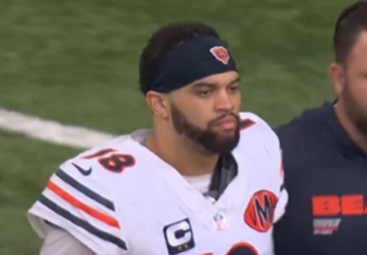 Caleb Williams walks off the field following Week 11 win.