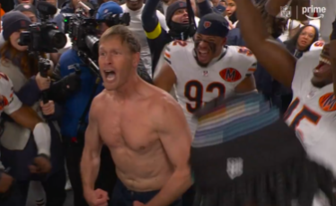 Chicago Bears head coach Ben Johnson reacts in the locker room following Week 13 win.