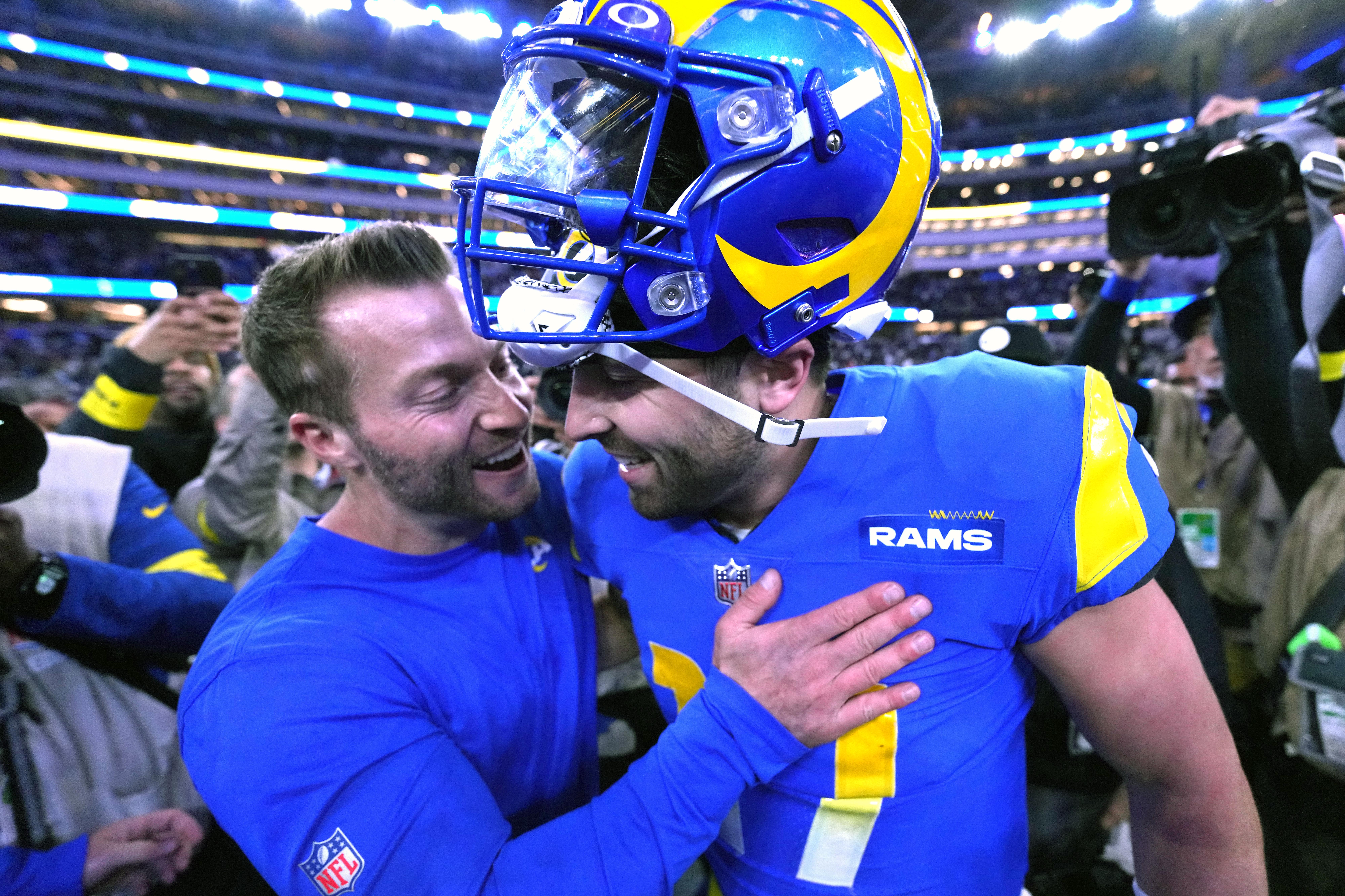 Dec 8, 2022; Inglewood, California, USA; Los Angeles Rams coach Sean McVay (left) and quarterback Baker Mayfield (17) celebrate after the game against the Las Vegas Raiders at SoFi Stadium.