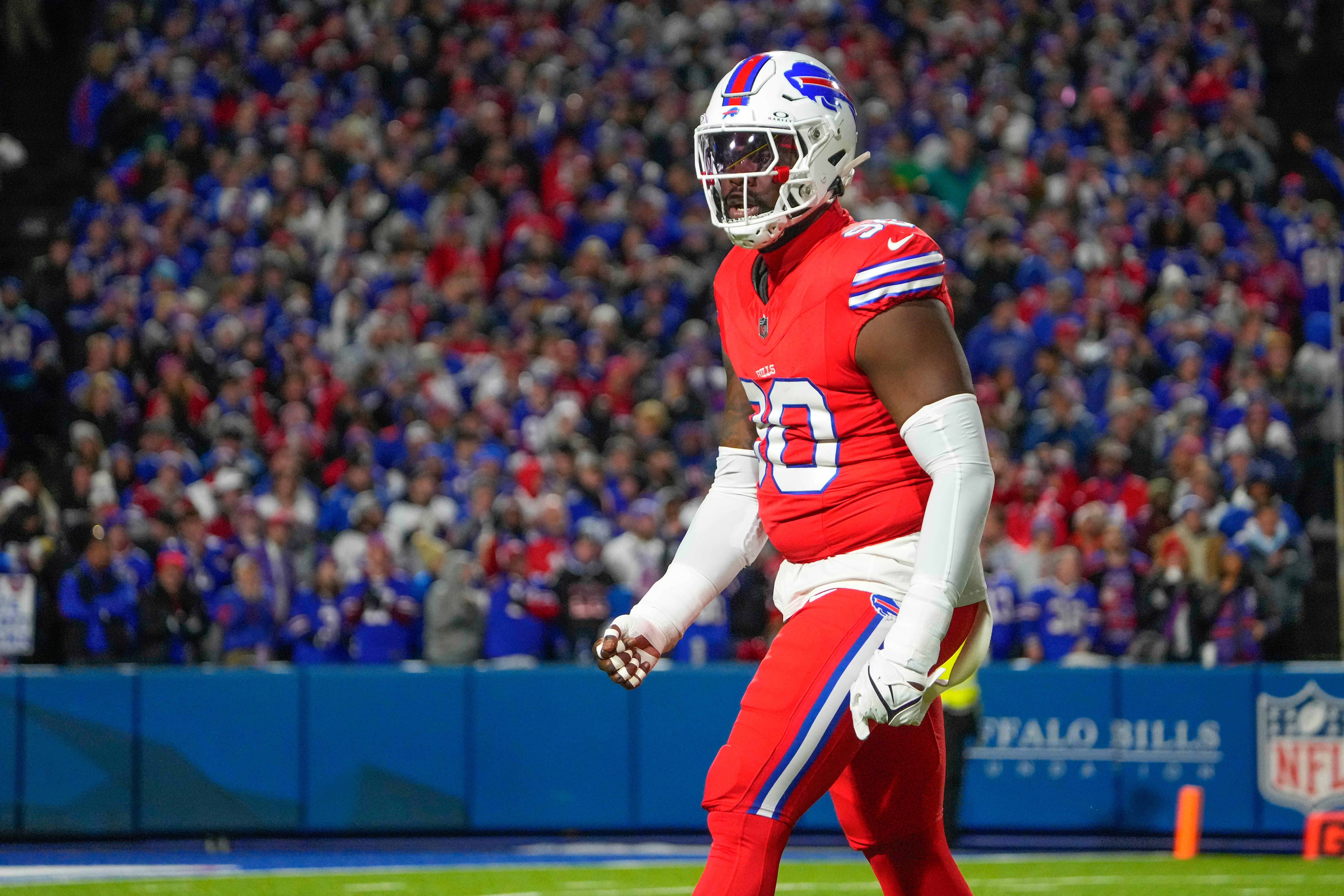 Oct 15, 2023; Orchard Park, New York, USA; Buffalo Bills defensive end Shaq Lawson (90) reacts to making a stop to force a punt against the New York Giants during the first half at Highmark Stadium.