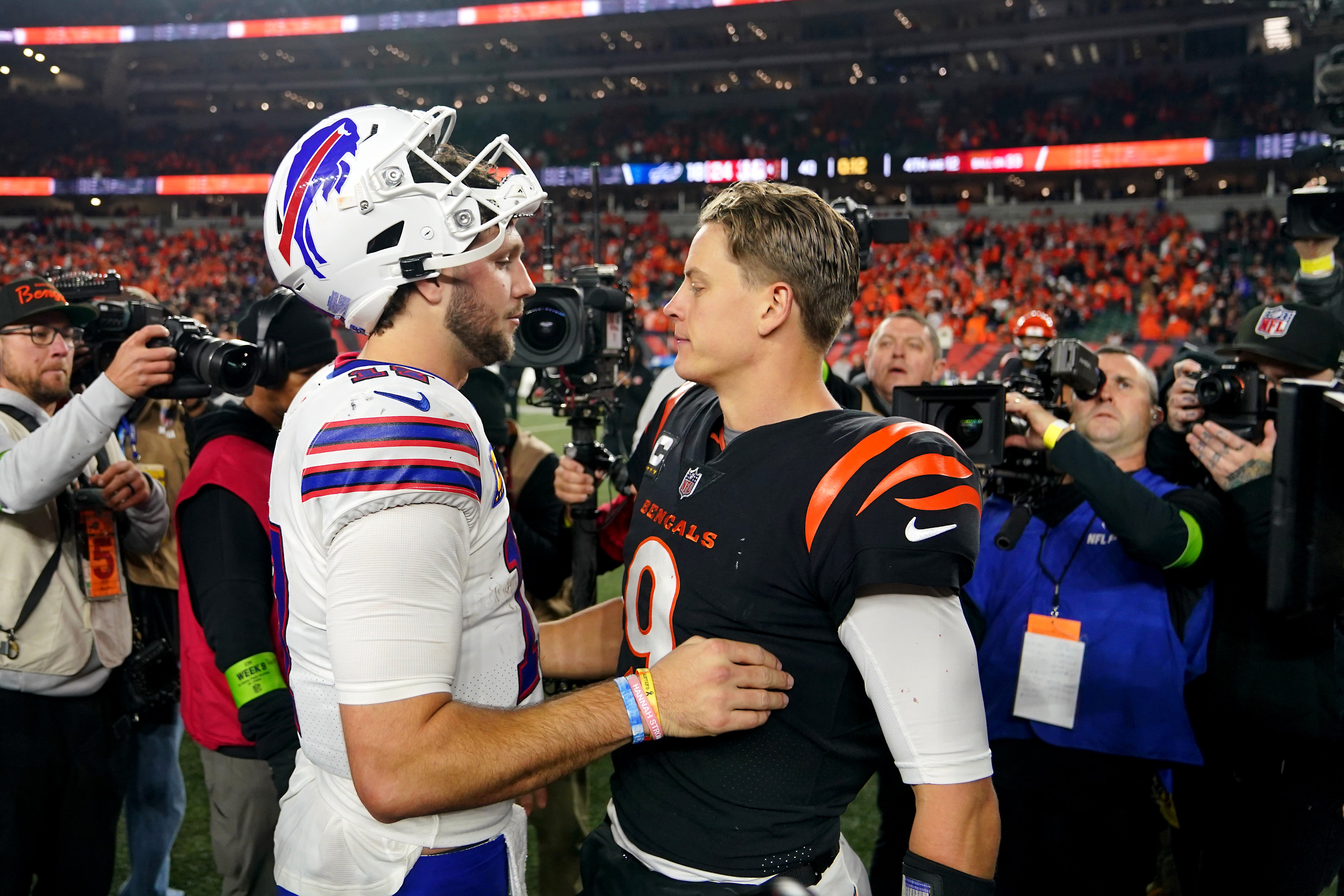 Nov 5, 2023; Cincinnati, Ohio, USA; Buffalo Bills quarterback Josh Allen (17) and Cincinnati Bengals quarterback Joe Burrow (9) shake hands at the conclusion of their game at Paycor Stadium.