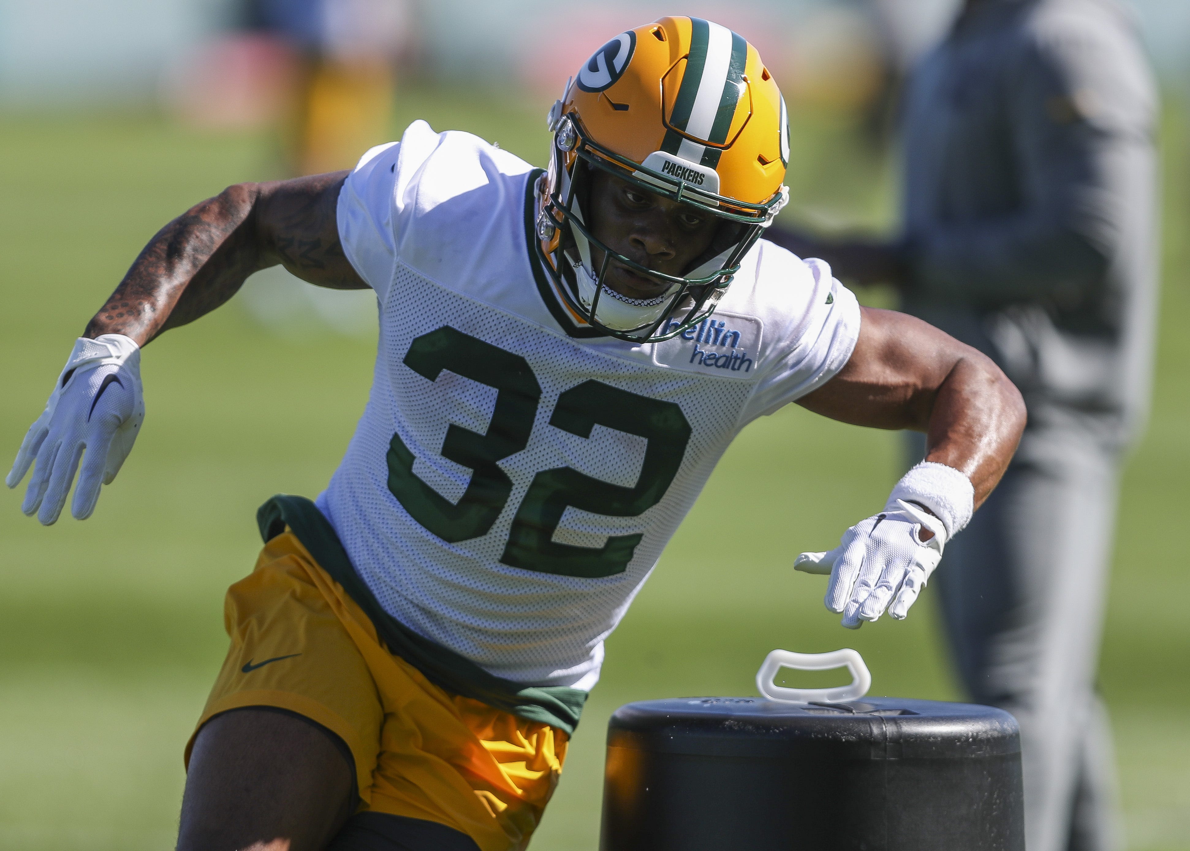 Green Bay Packers running back MarShawn Lloyd (32) runs through drills during rookie minicamp on Friday, May 3, 2024, at the Don Hutson Center in Green Bay, Wis.