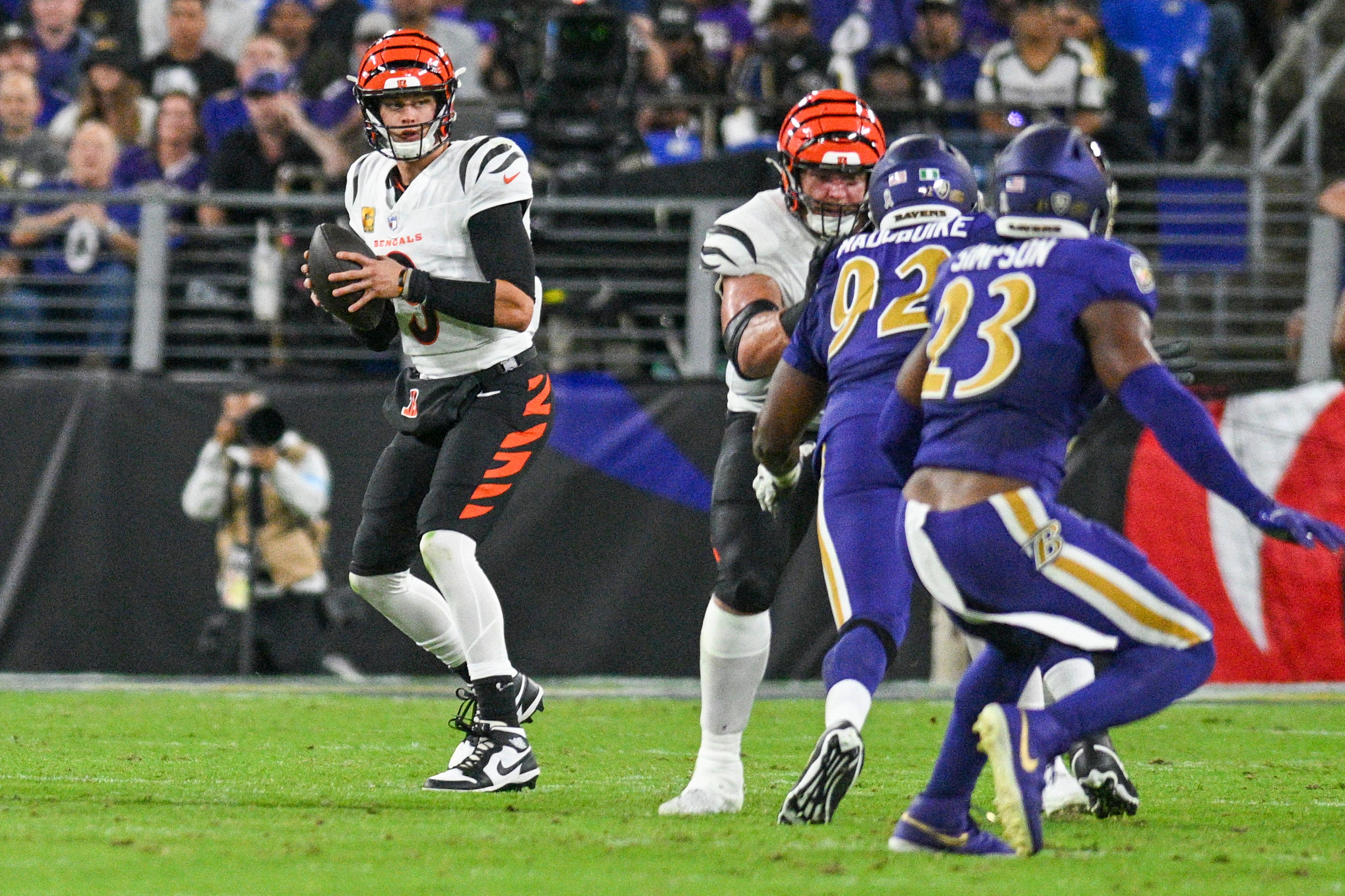 Nov 7, 2024; Baltimore, Maryland, USA; Cincinnati Bengals quarterback Joe Burrow (9) drops back to pass during the first quarter against the Baltimore Ravens at M&T Bank Stadium.
