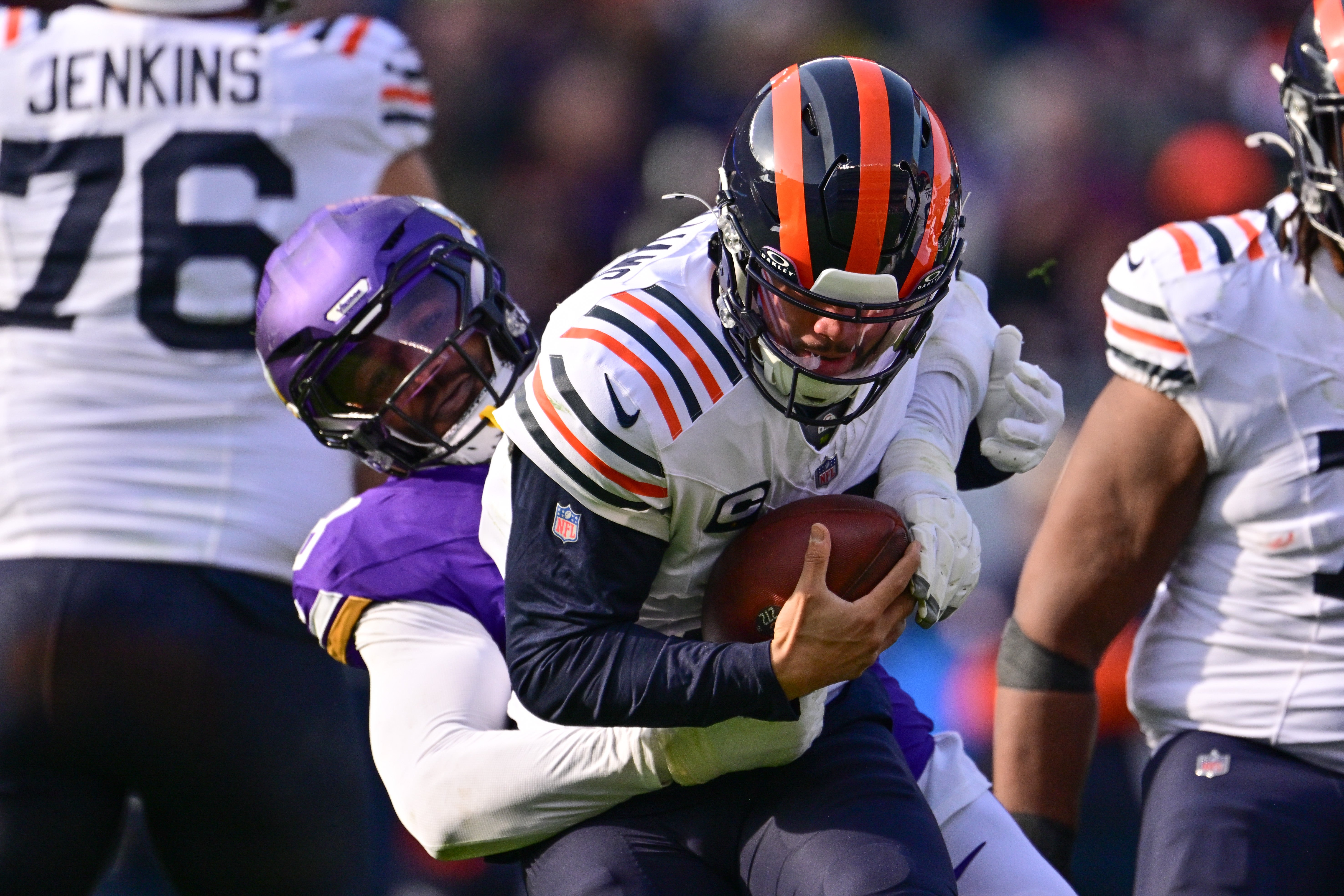 Nov 24, 2024; Chicago, Illinois, USA; Minnesota Vikings linebacker Jonathan Greenard (58) sacks Chicago Bears quarterback Caleb Williams (18) during the second quarter at Soldier Field.