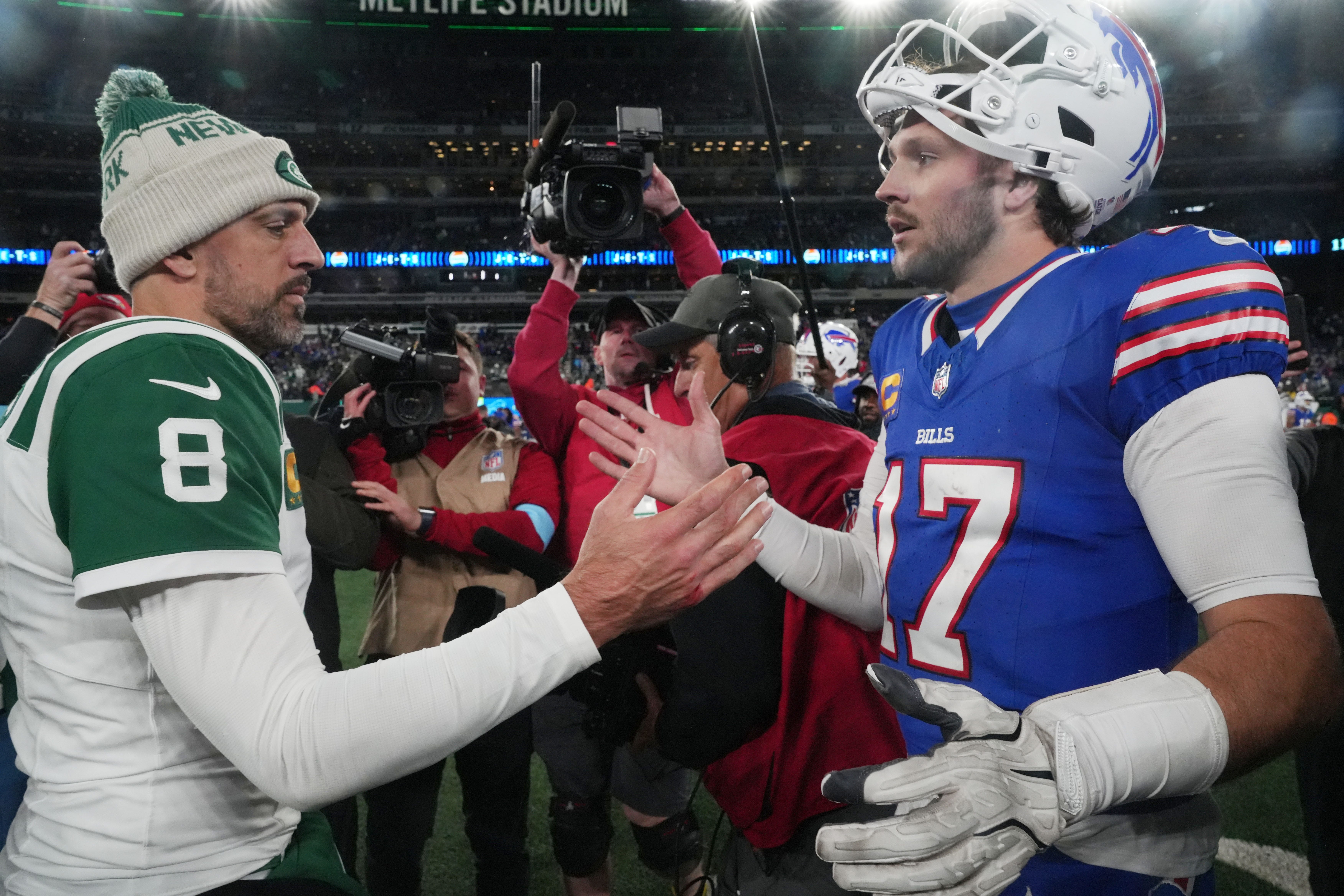 East Rutherford, NJ -- October 14, 2024 -- Aaron Rodgers of the Jets and Josh Allen of Buffalo at the end of the game. The Buffalo Bills came to MetLife Stadium to play the NY Jets. The Jets played their first game under new interim head coach Jeff Ulbrich.