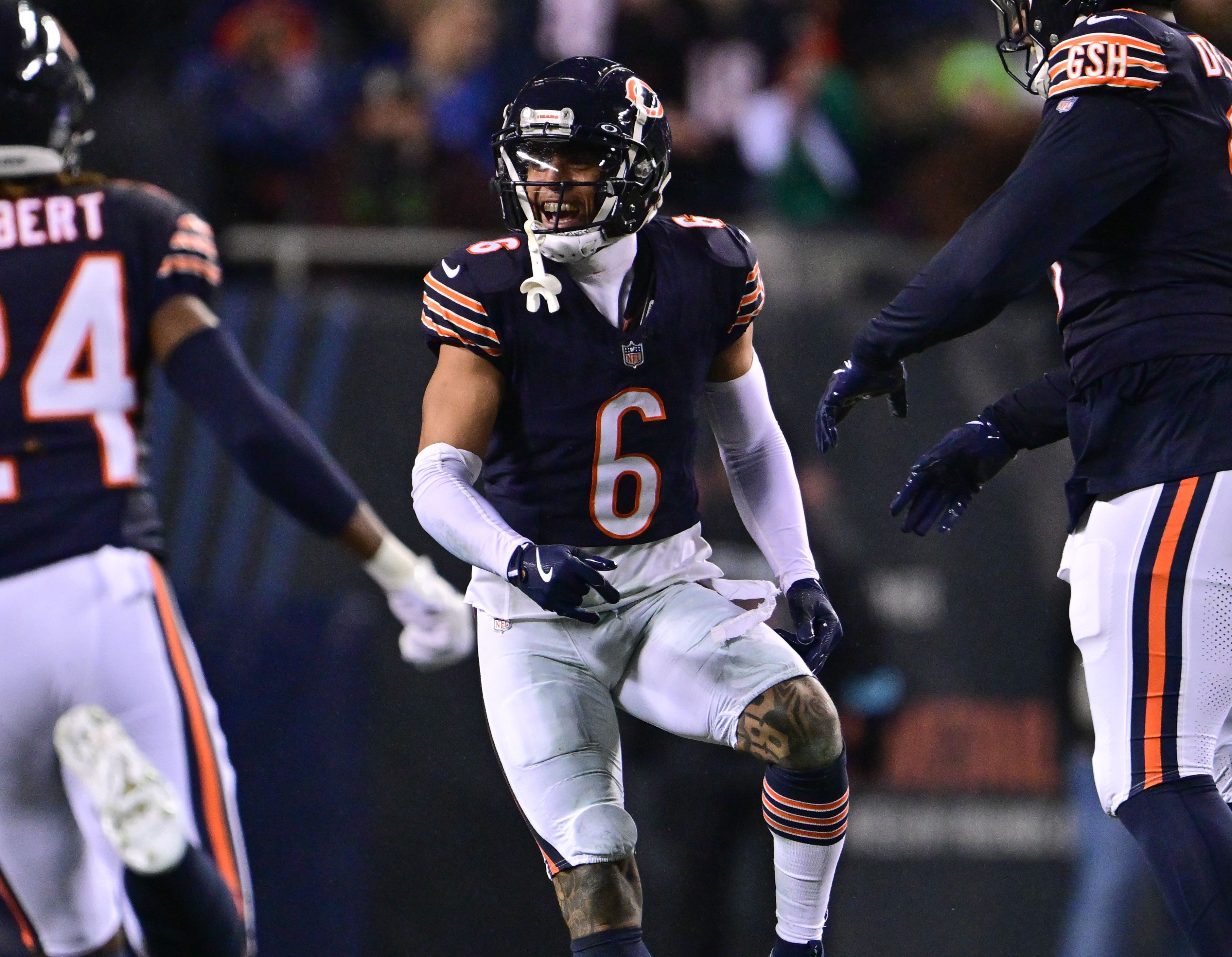 Dec 26, 2024; Chicago, Illinois, USA; Chicago Bears cornerback Kyler Gordon (6) celebrates a fumble recovery against the Seattle Seahawks during the third quarter at Soldier Field.