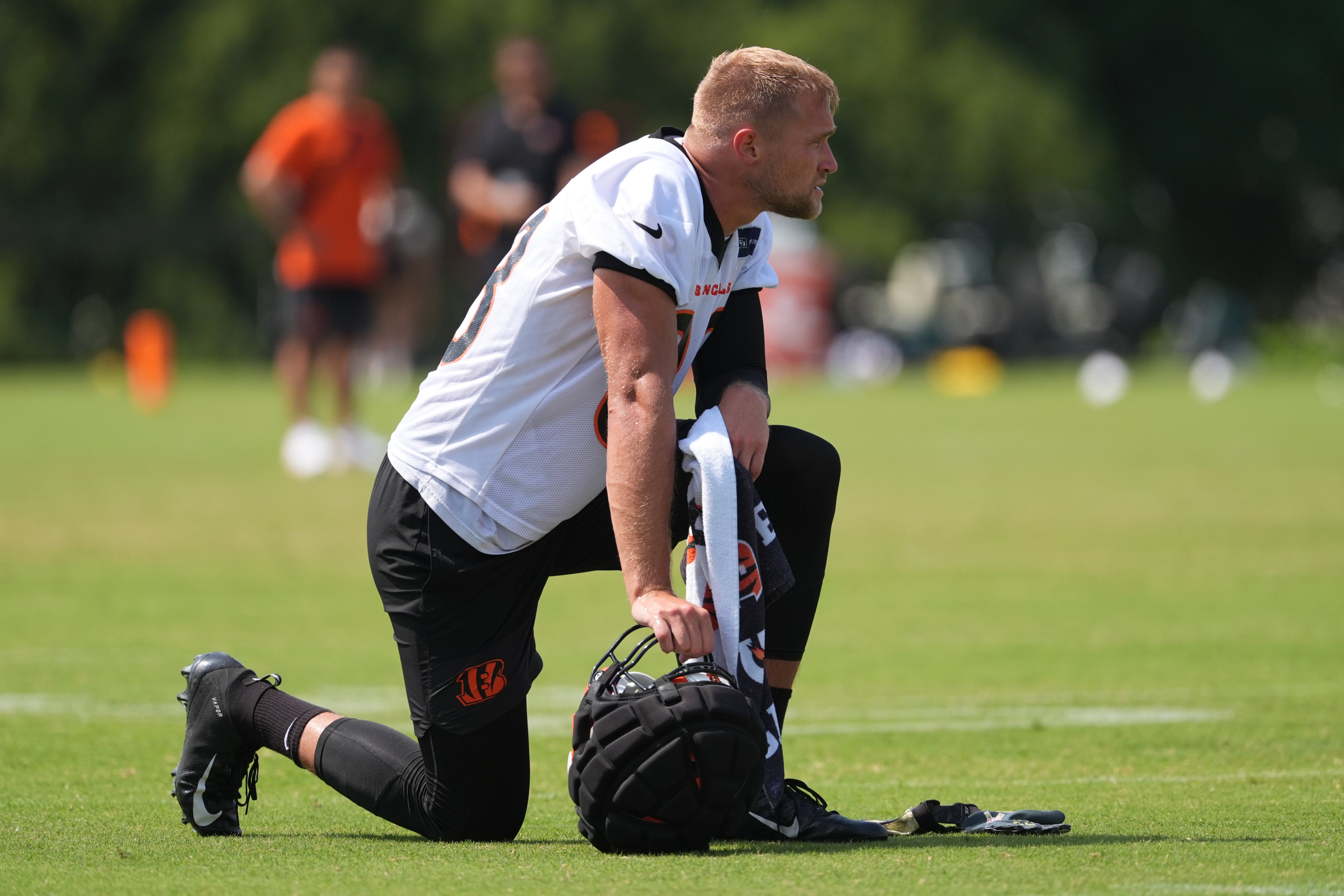 Jul 25, 2025; Cincinnati, OH, USA; Cincinnati Bengals tight end Mike Gesicki (88) takes a knee during training camp practice.