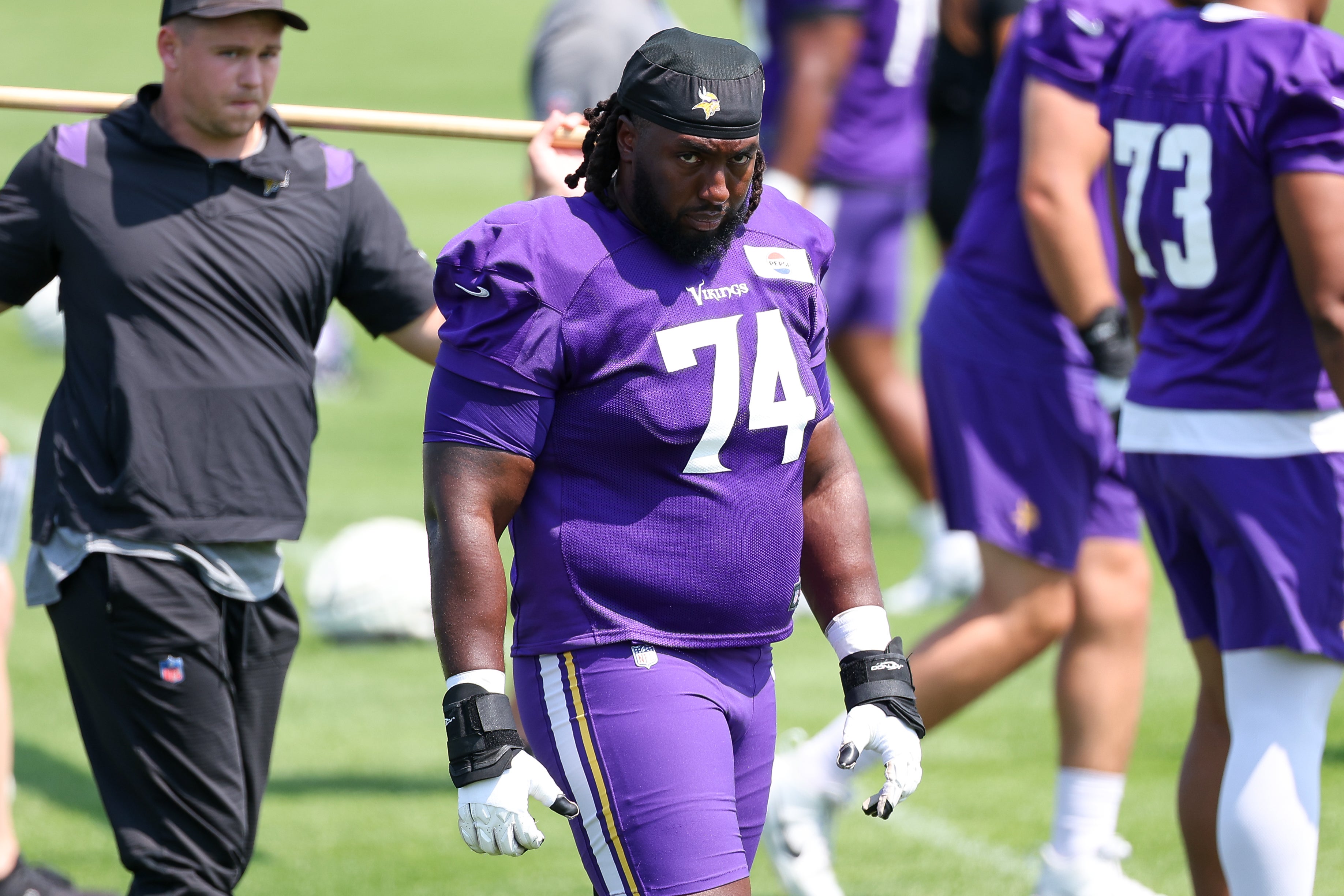 Jul 29, 2025; Eagan, MN, USA; Minnesota Vikings guard Donovan Jackson (74) takes part in drills during the teams training camp at the Minnesota Vikings Training Facility.