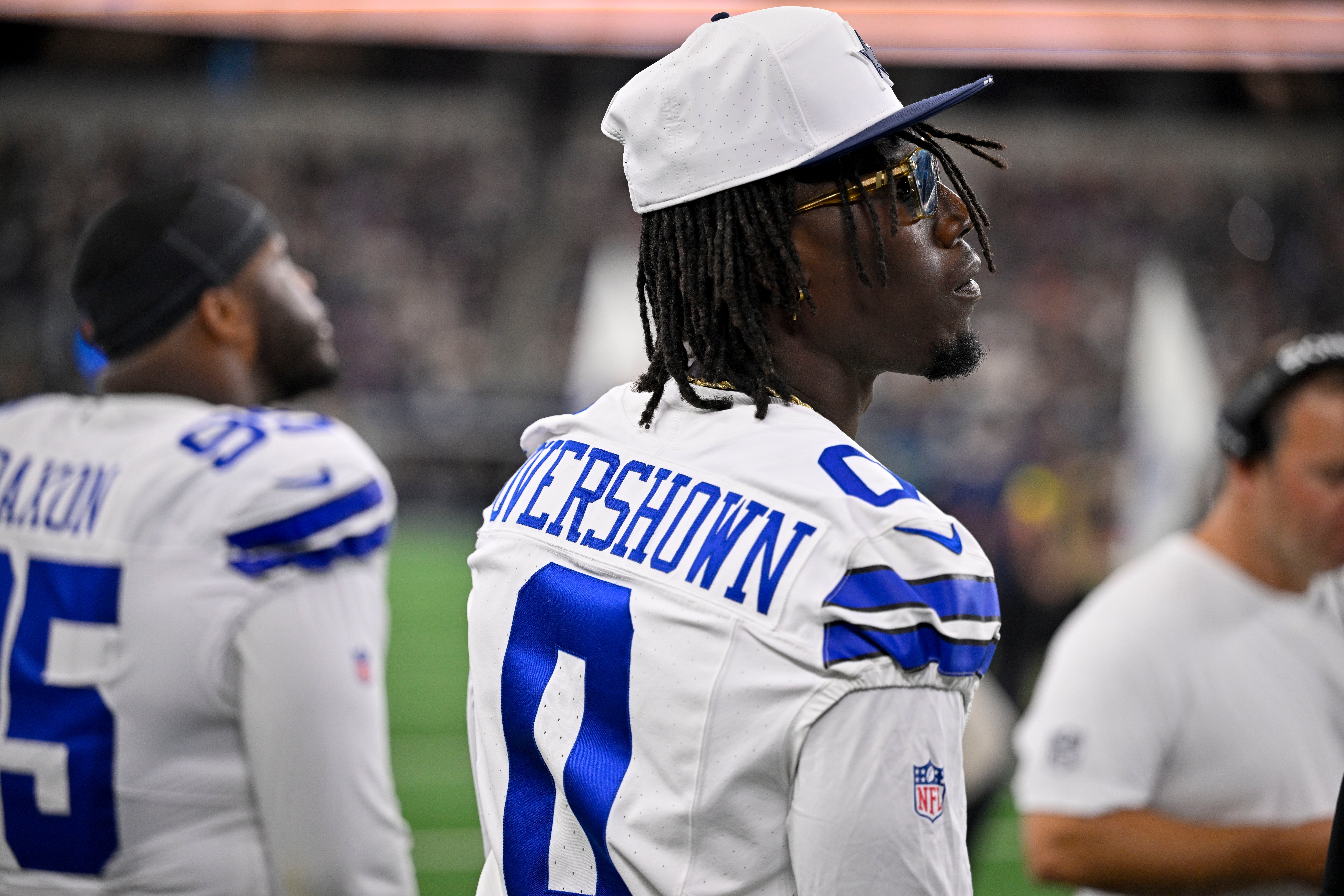 Aug 16, 2025; Arlington, Texas, USA; Dallas Cowboys linebacker DeMarvion Overshown (0) looks on before the game between the Dallas Cowboys and the Baltimore Ravens at AT&T Stadium.
