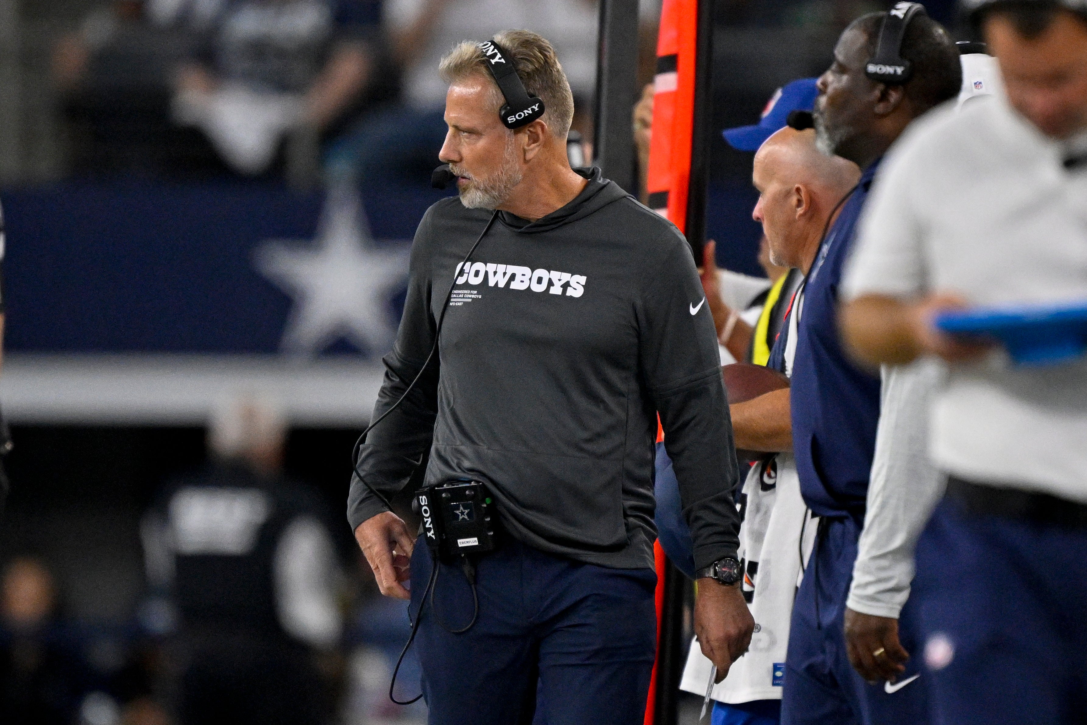 Aug 16, 2025; Arlington, Texas, USA; Dallas Cowboys defensive coordinator Matt Eberflus looks on during the game between the Dallas Cowboys and the Baltimore Ravens at AT&T Stadium.