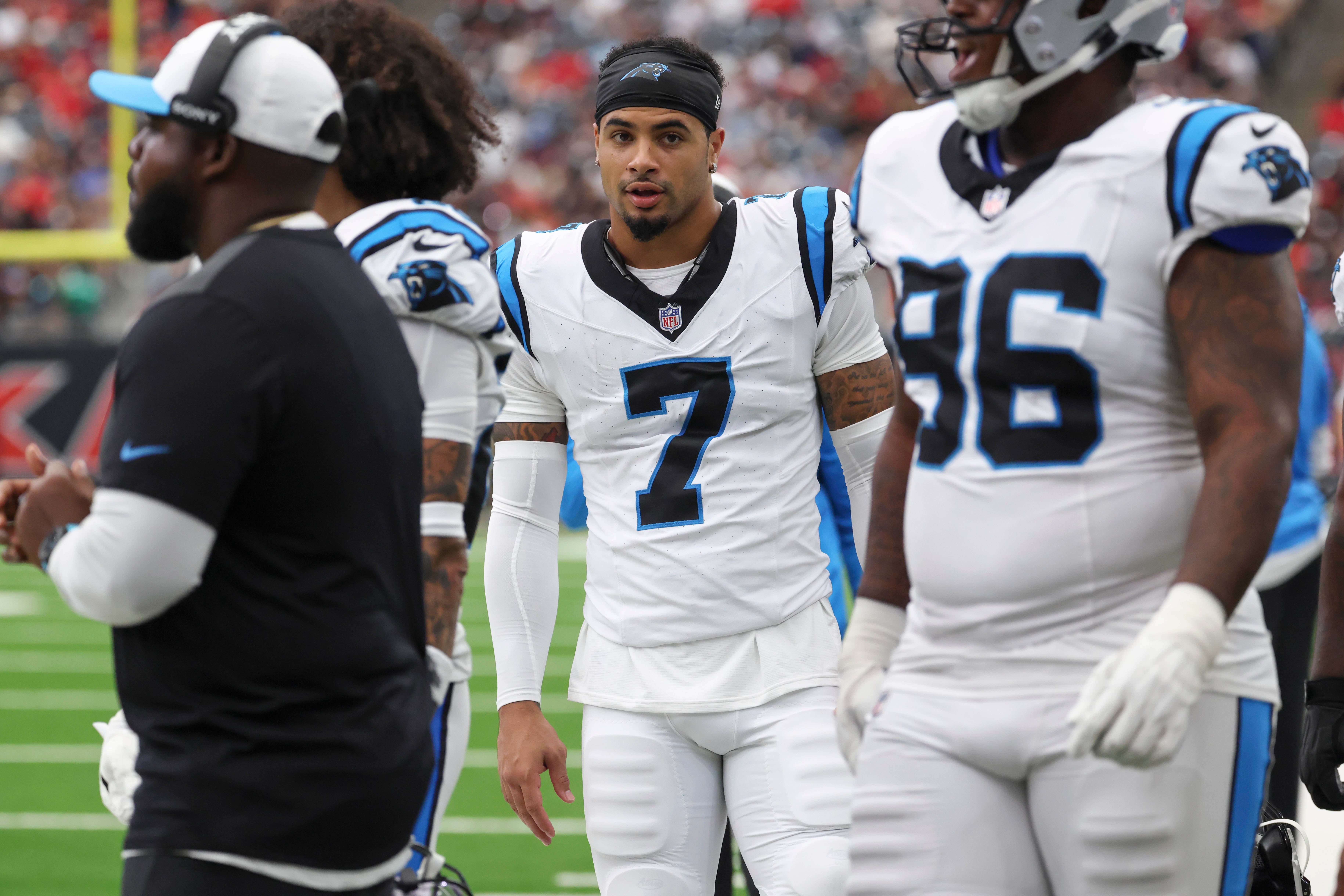 Aug 16, 2025; Houston, Texas, USA; Carolina Panthers safety Tre'von Moehrig (7) walks on the sideline during the game against the Houston Texans at NRG Stadium.
