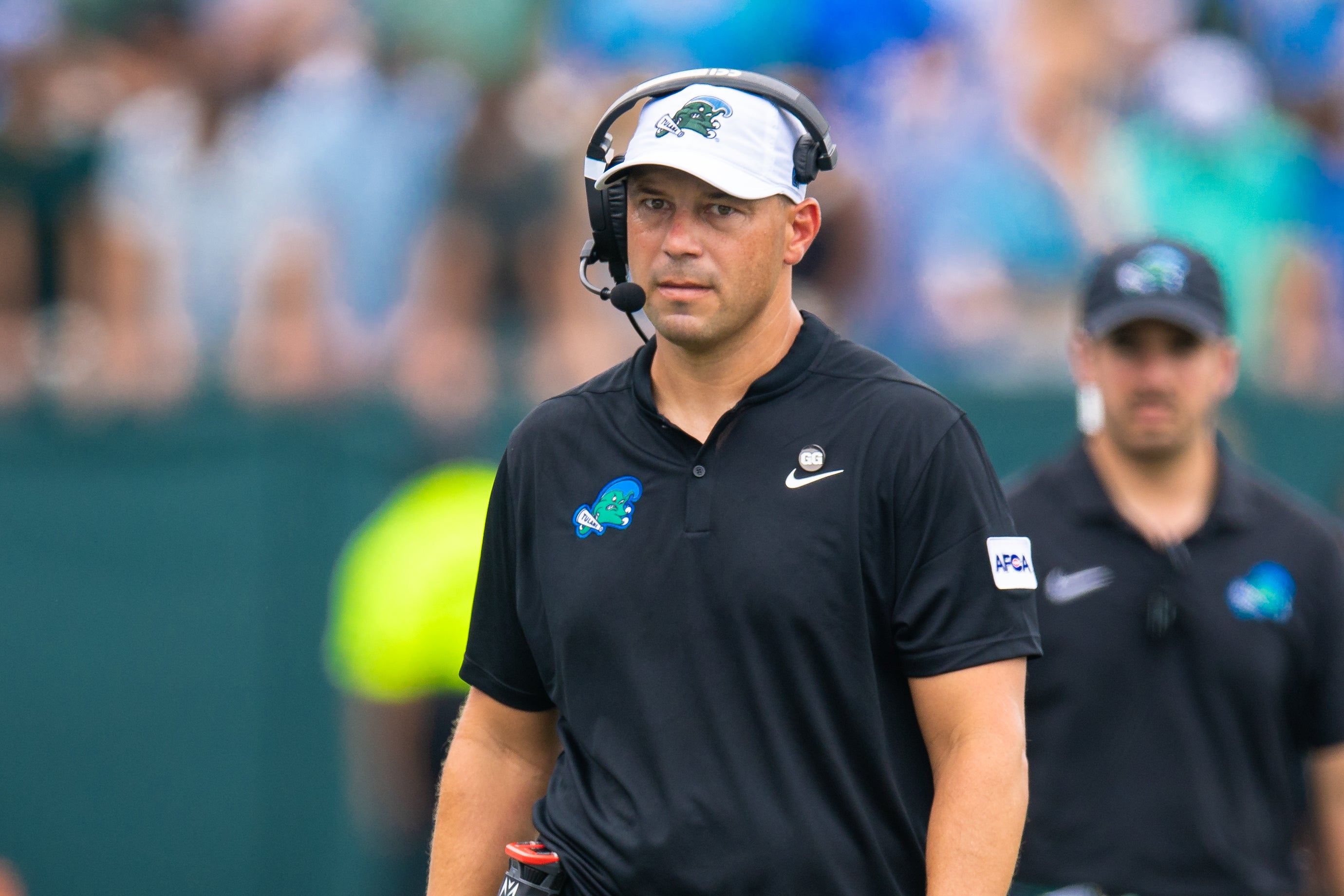 Aug 30, 2025; New Orleans, Louisiana, USA; Tulane Green Wave head coach Jon Sumrall looks on against Northwestern Wildcats during the first half at Yulman Stadium.