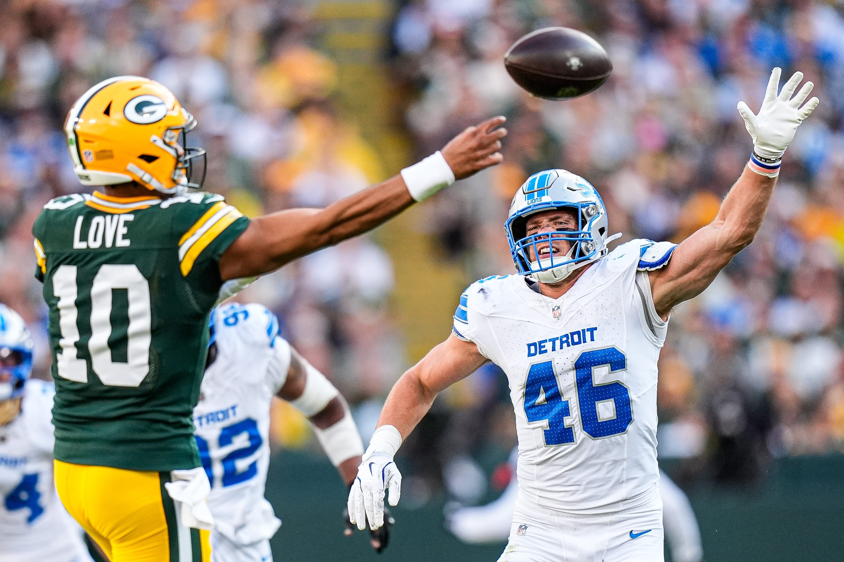 Detroit Lions linebacker Jack Campbell (46) tries to block a pass from Green Bay Packers quarterback Jordan Love (10) during the second half at Lambeau Field in Green Bay, Wis., on Sunday, September 7, 2025.