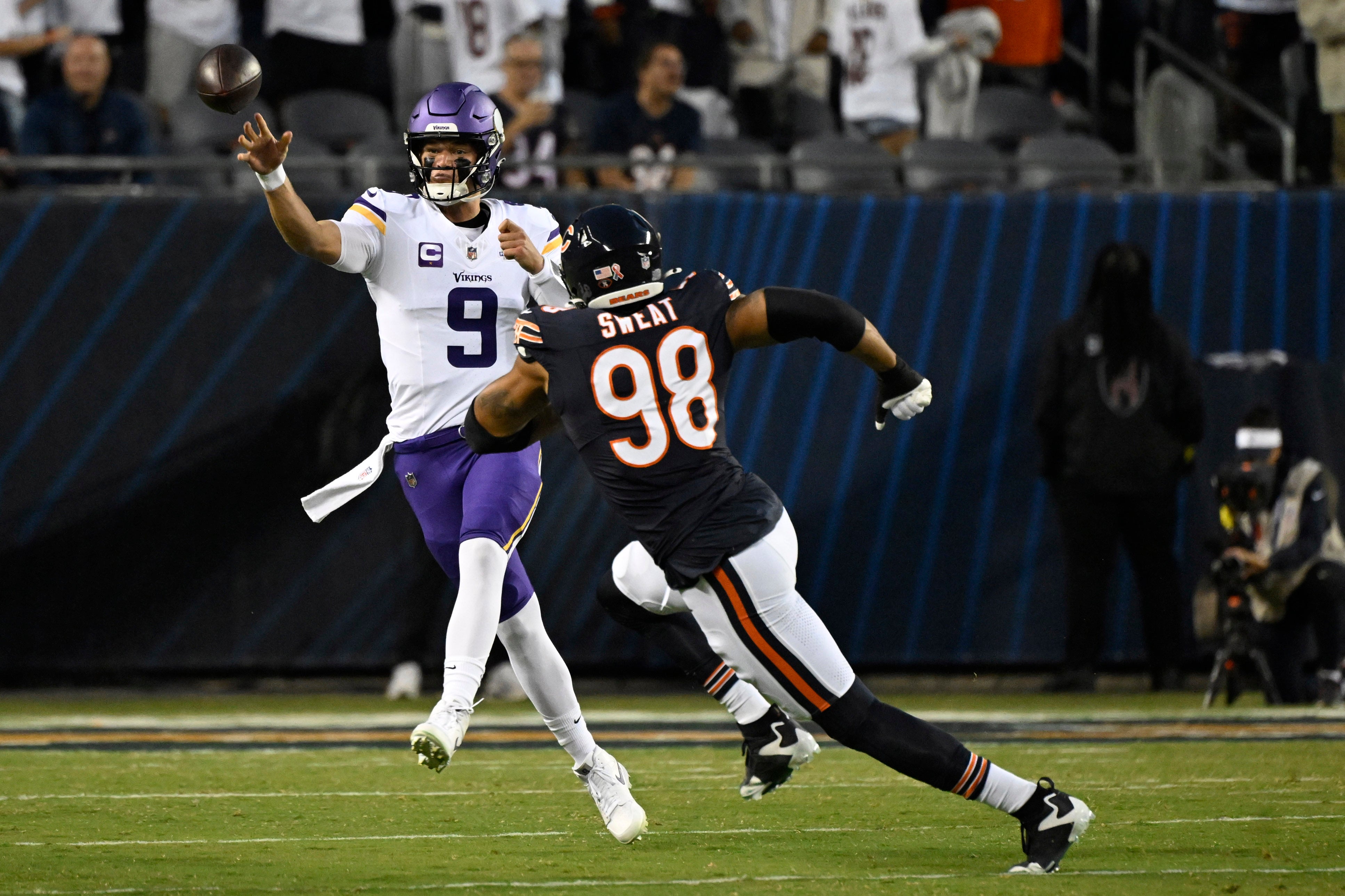 Sep 8, 2025; Chicago, Illinois, USA; Minnesota Vikings quarterback J.J. McCarthy (9) drops back to pass against the Chicago Bears during the first half at Soldier Field.