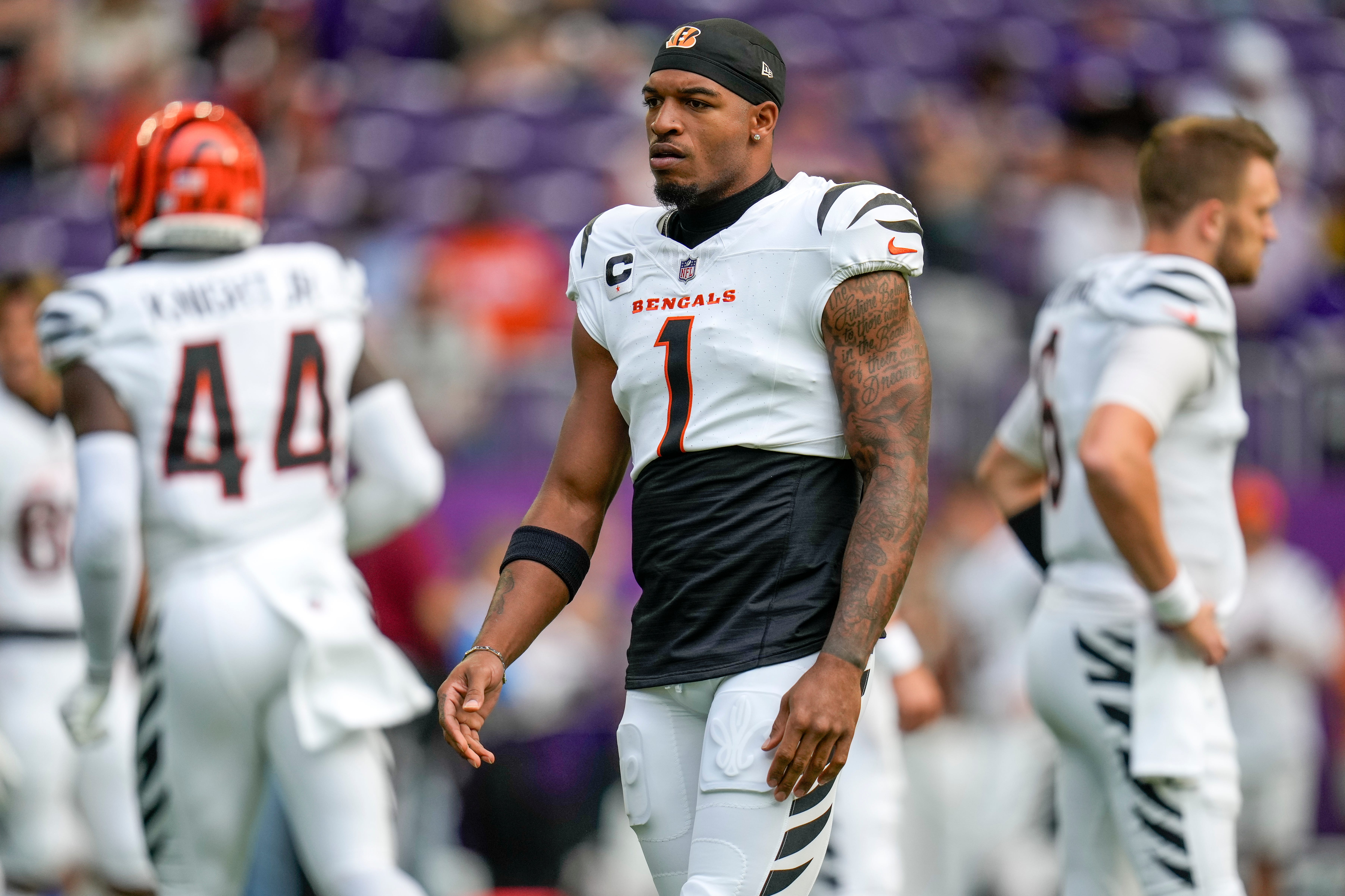 Cincinnati Bengals wide receiver Ja'Marr Chase (1) paces on the field during warmups before the first quarter of the NFL Week 3 game between the Minnesota Vikings and the Cincinnati Bengals at U.S. Bank Stadium in Minneapolis on Sunday, Sept. 21, 2025.