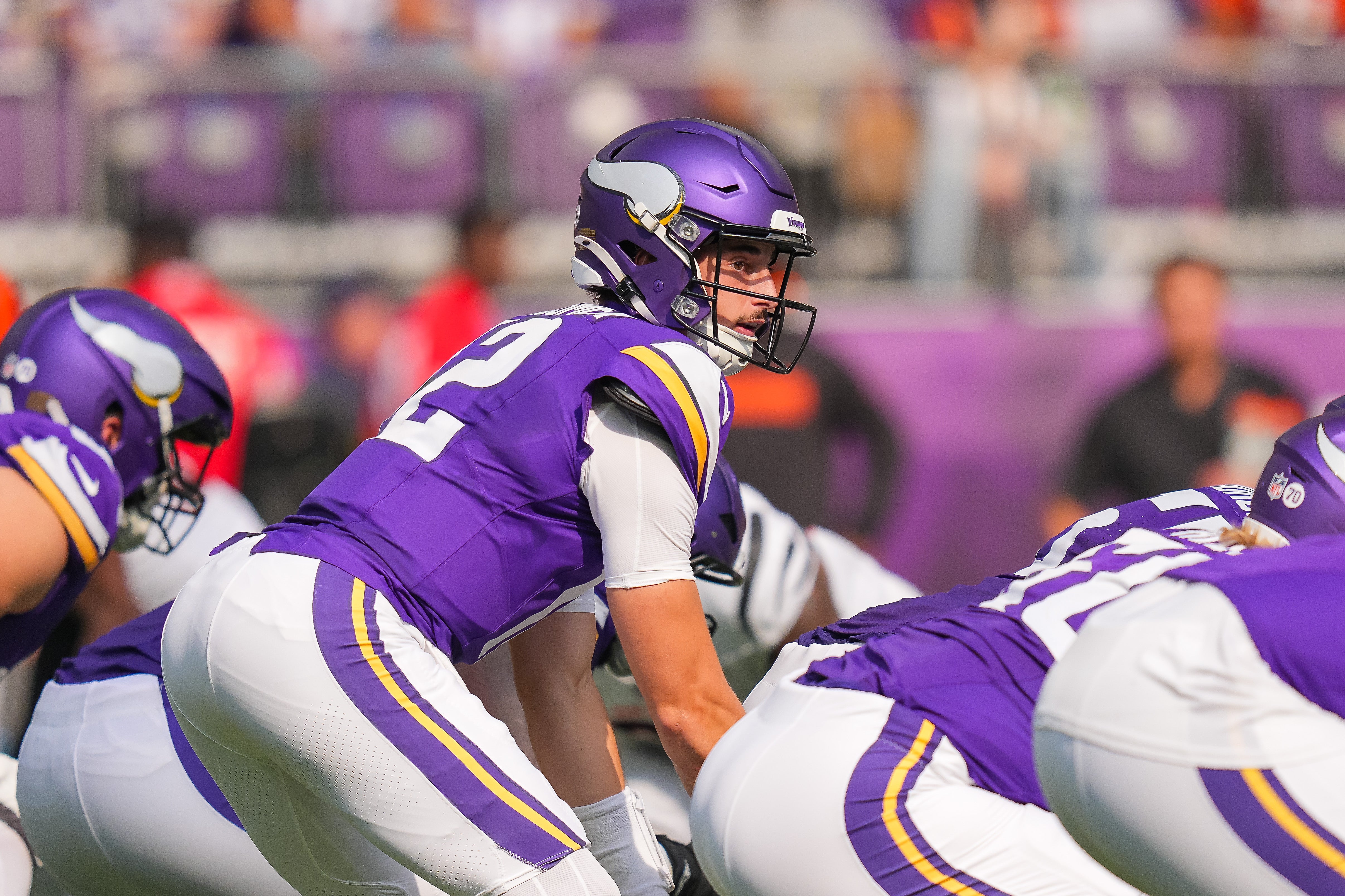 Sep 21, 2025; Minneapolis, Minnesota, USA; Minnesota Vikings quarterback Max Brosmer (12) under center against the Cincinnati Bengals during the second half at U.S. Bank Stadium.