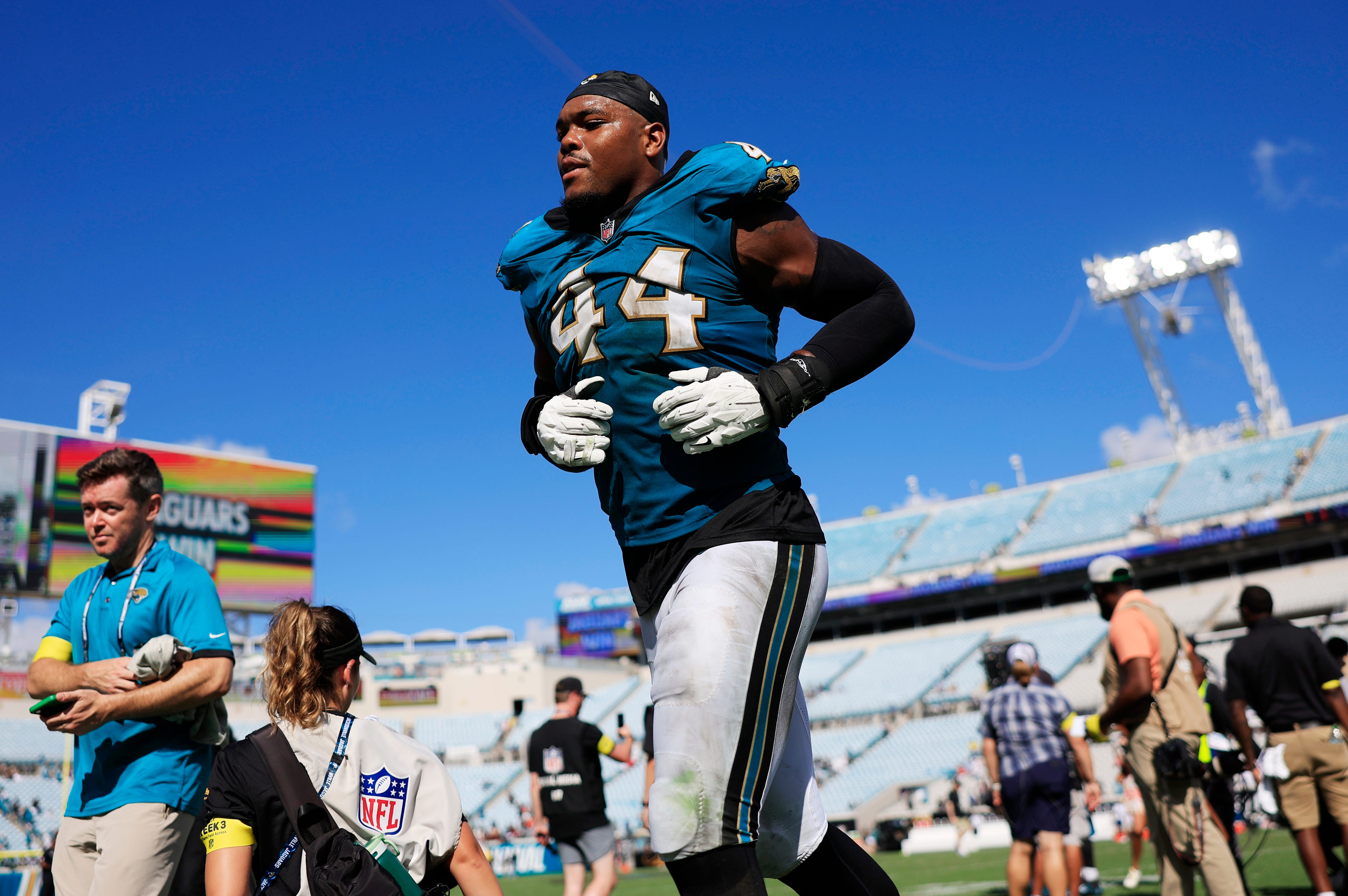 Jacksonville Jaguars defensive end Travon Walker (44) runs off the field