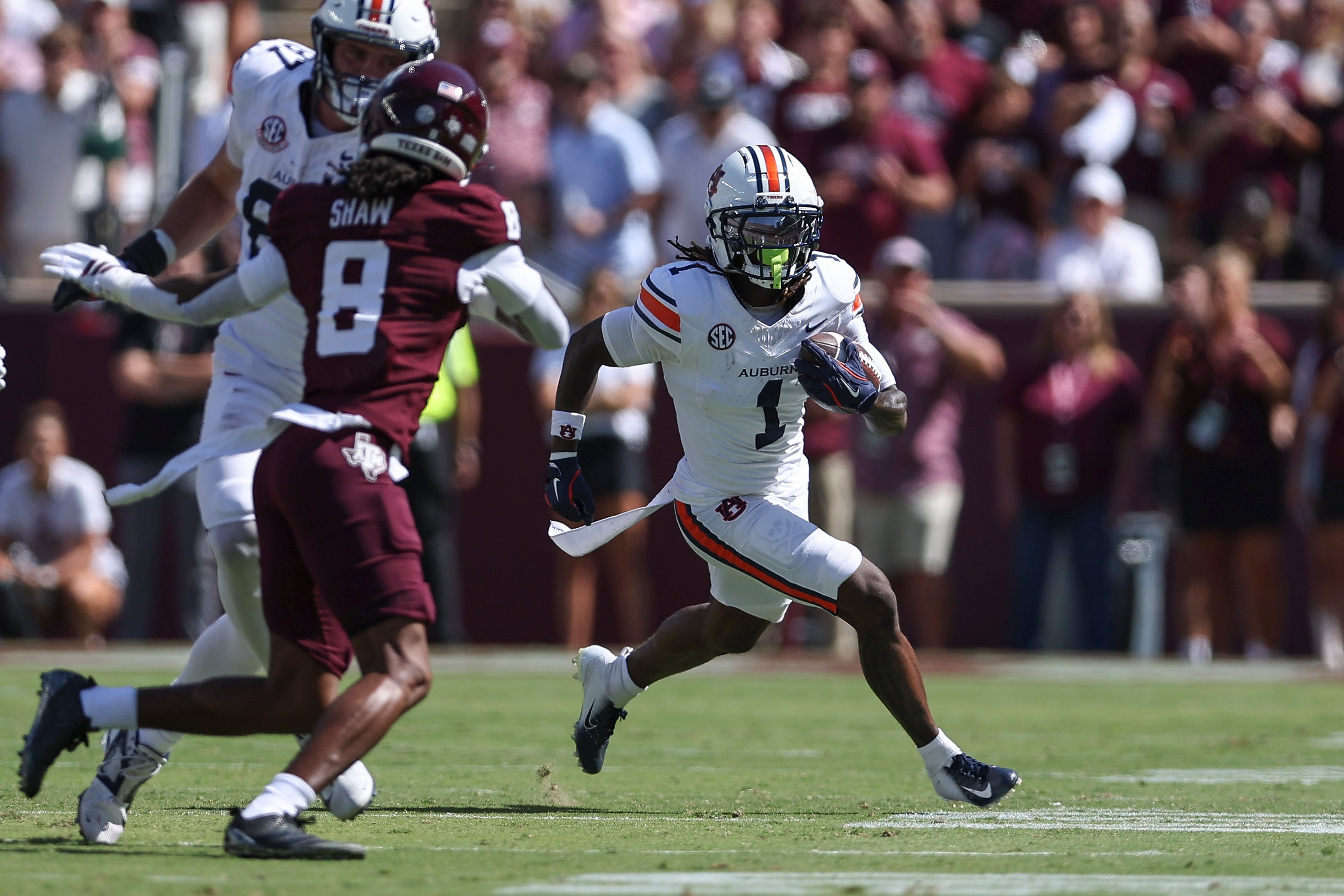 Sep 27, 2025; College Station, Texas, USA; Auburn Tigers wide receiver Eric Singleton Jr. (1) runs with the ball during the first quarter against the Texas A&M Aggies at Kyle Field. Mandatory Credit: Troy Taormina-Imagn Images