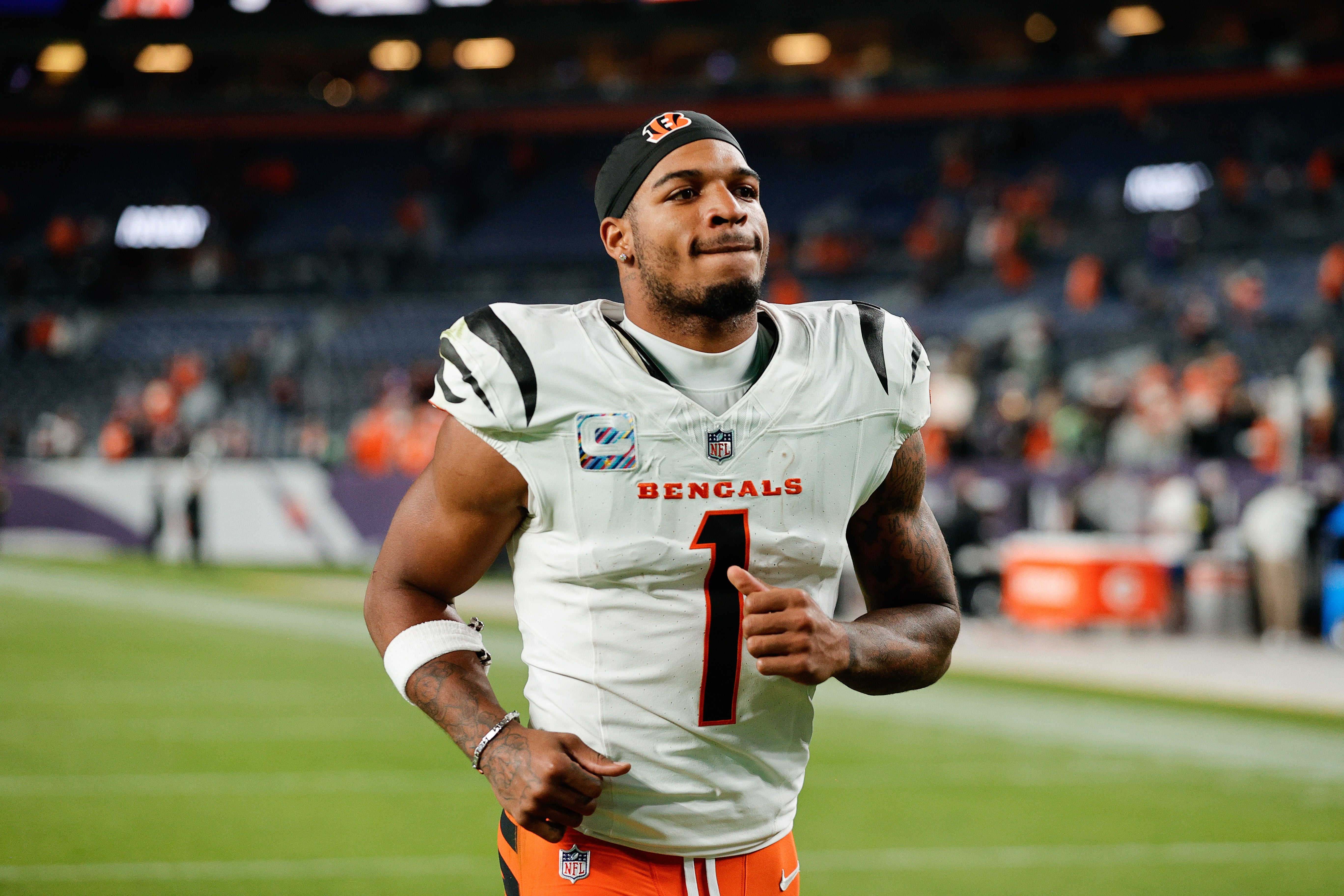 Sep 29, 2025; Denver, Colorado, USA; Cincinnati Bengals wide receiver Ja'Marr Chase (1) looks on after the game against the Denver Broncos at Empower Field at Mile High.