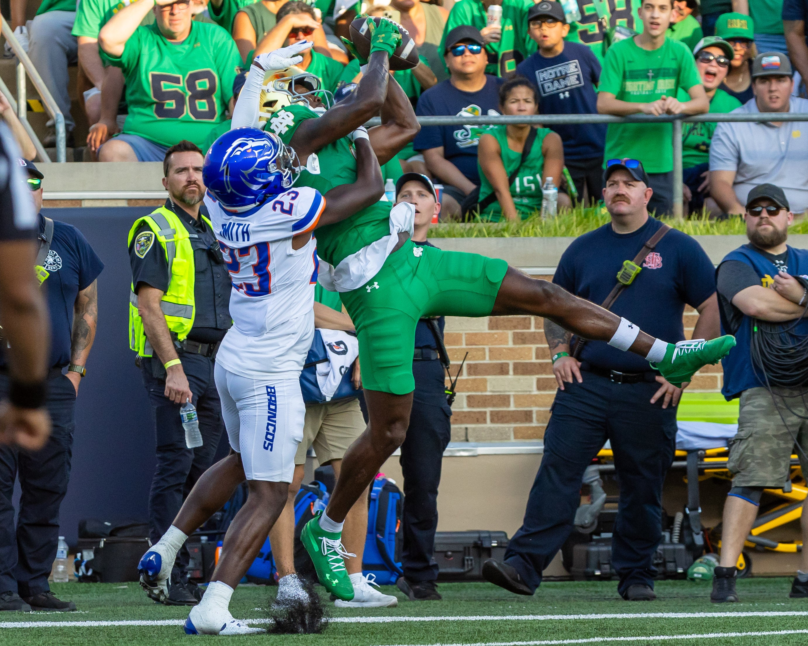 Oct 4, 2025; South Bend, Indiana, USA; Notre Dame Fighting Irish wide receiver Malachi Fields (0) makes a catch for a touchdown as Boise State Broncos defensive back Sherrod Smith (23) defends during the second half at Notre Dame Stadium. Mandatory Credit: Michael Caterina-Imagn Images