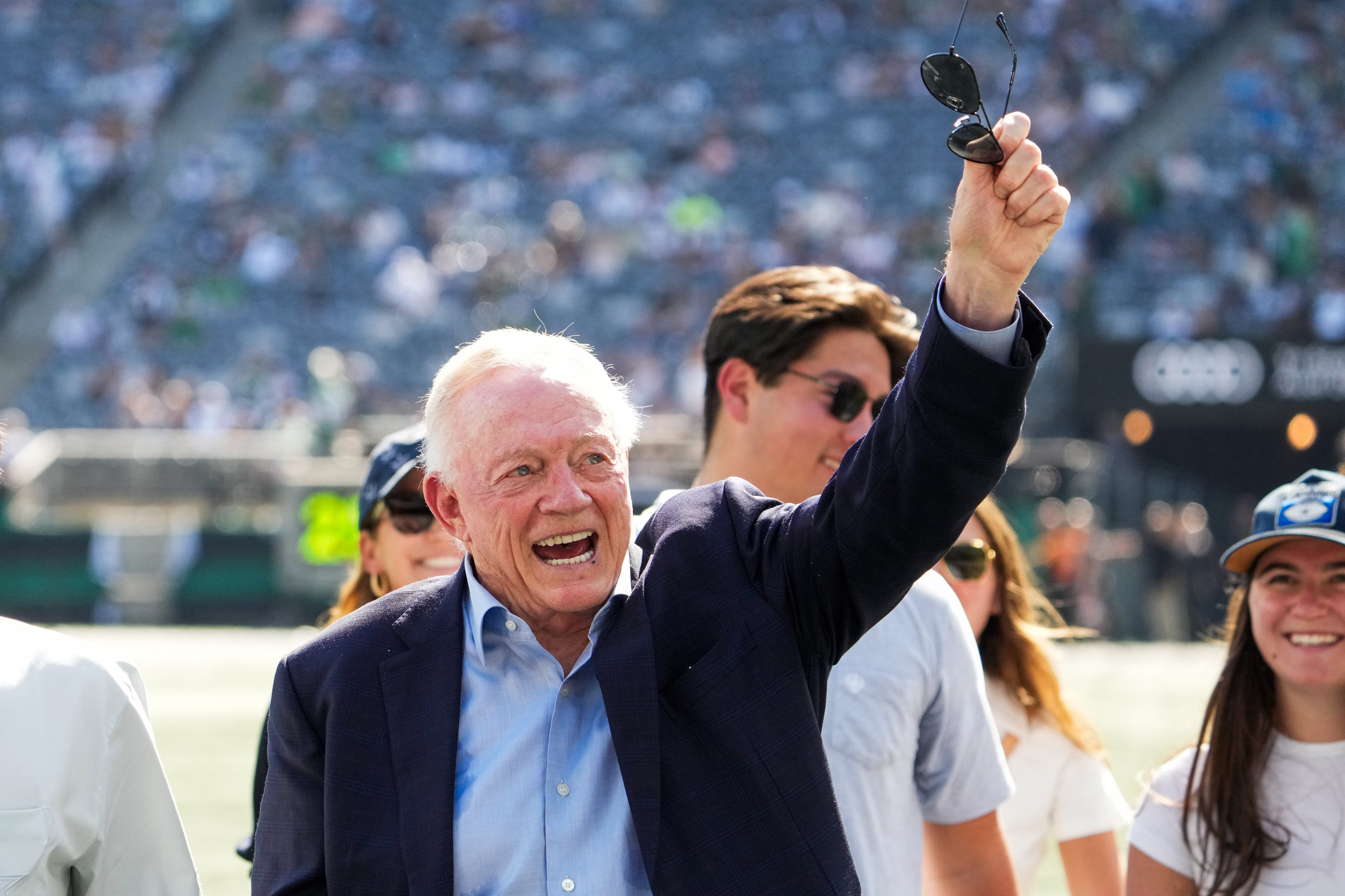 Dallas Cowboys Owner, President and general manager Jerry Jones waves on the field prior to a game against the New York Jets at MetLife Stadium.