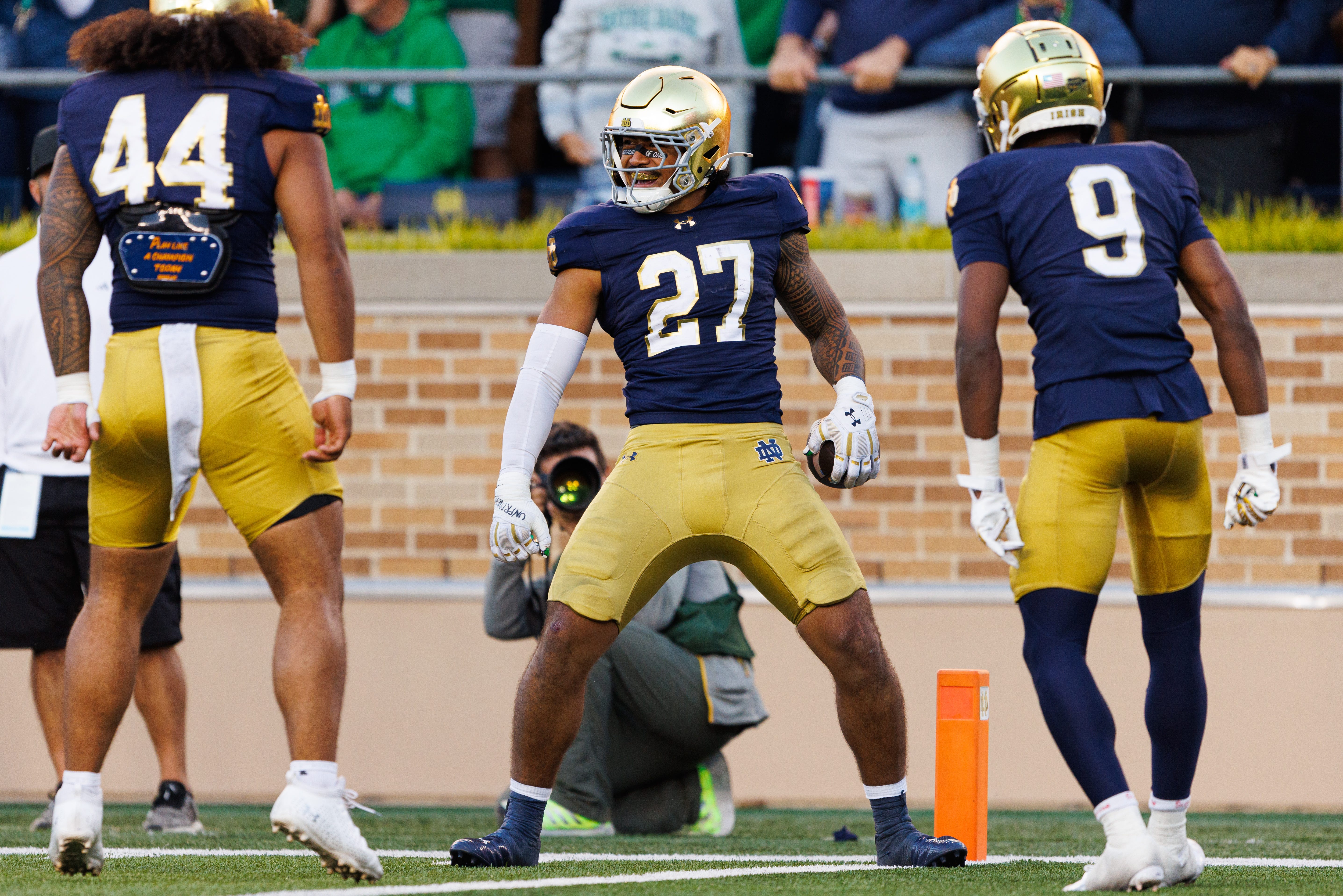 Notre Dame linebacker Kyngstonn Viliamu-Asa (27) celebrates after intercepting a pass in the second half of a NCAA football game against NC State at Notre Dame Stadium on Saturday, Oct. 11, 2025, in South Bend.