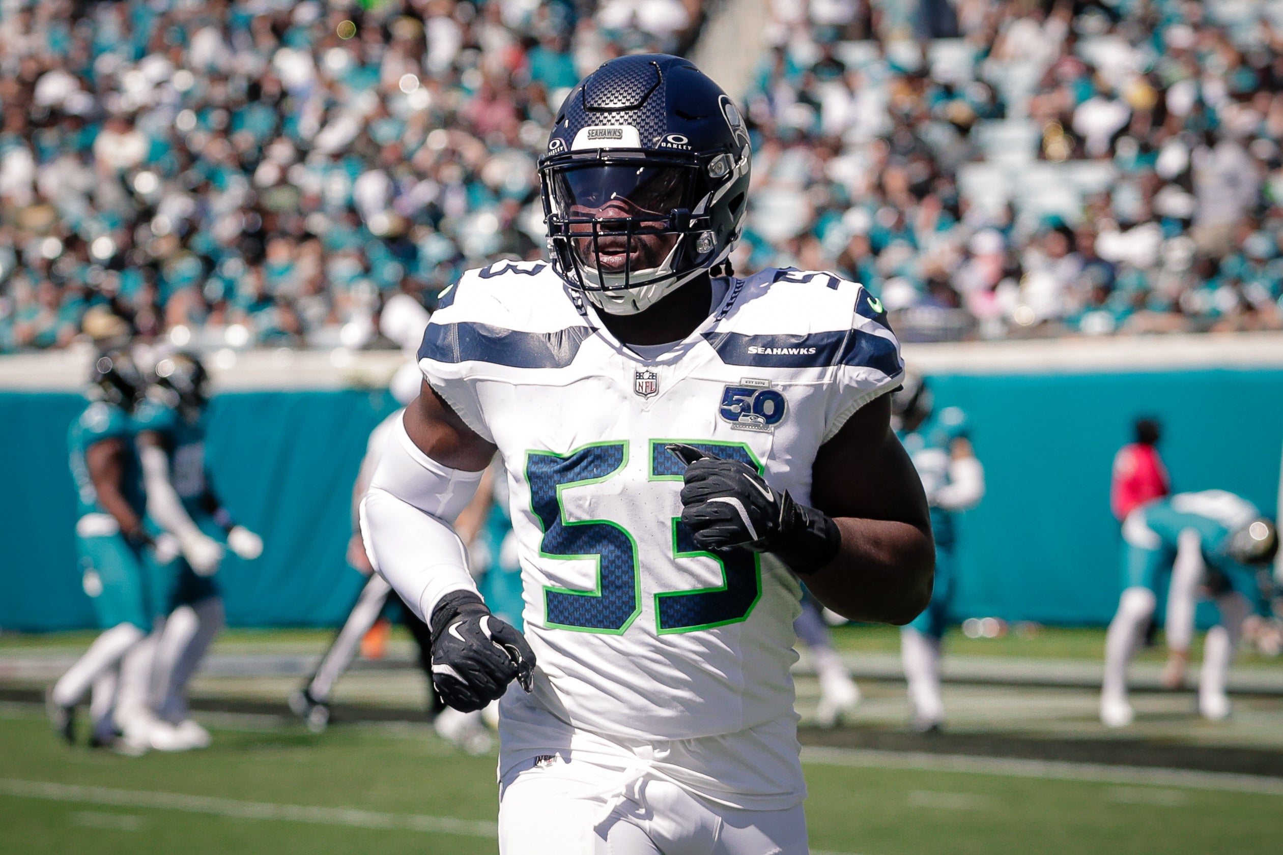 Seattle Seahawks linebacker Boye Mafe (53) runs off the field