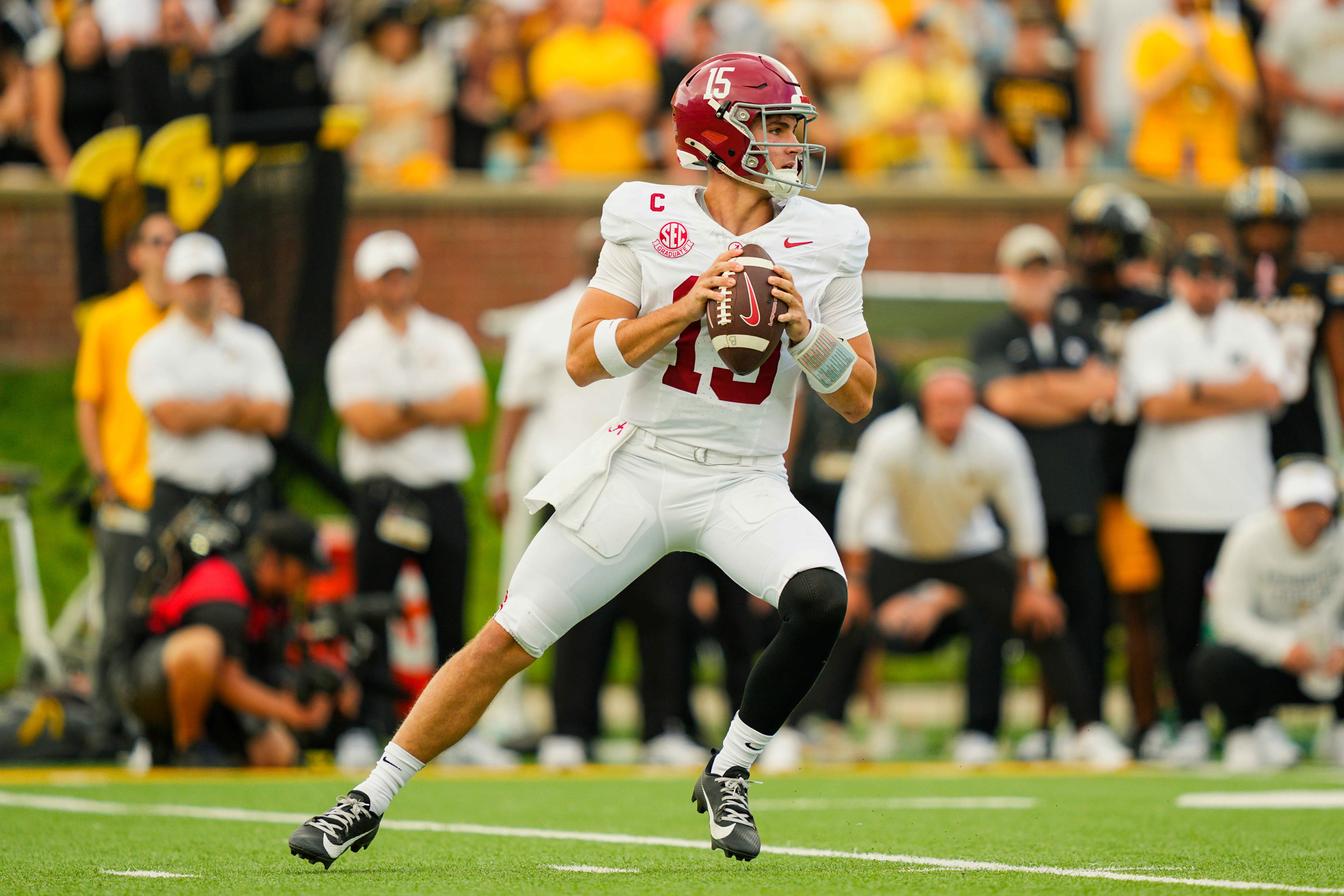 Oct 11, 2025; Columbia, Missouri, USA; Alabama Crimson Tide quarterback Ty Simpson (15) drops back to pass during the second half against the Missouri Tigers at Faurot Field at Memorial Stadium.