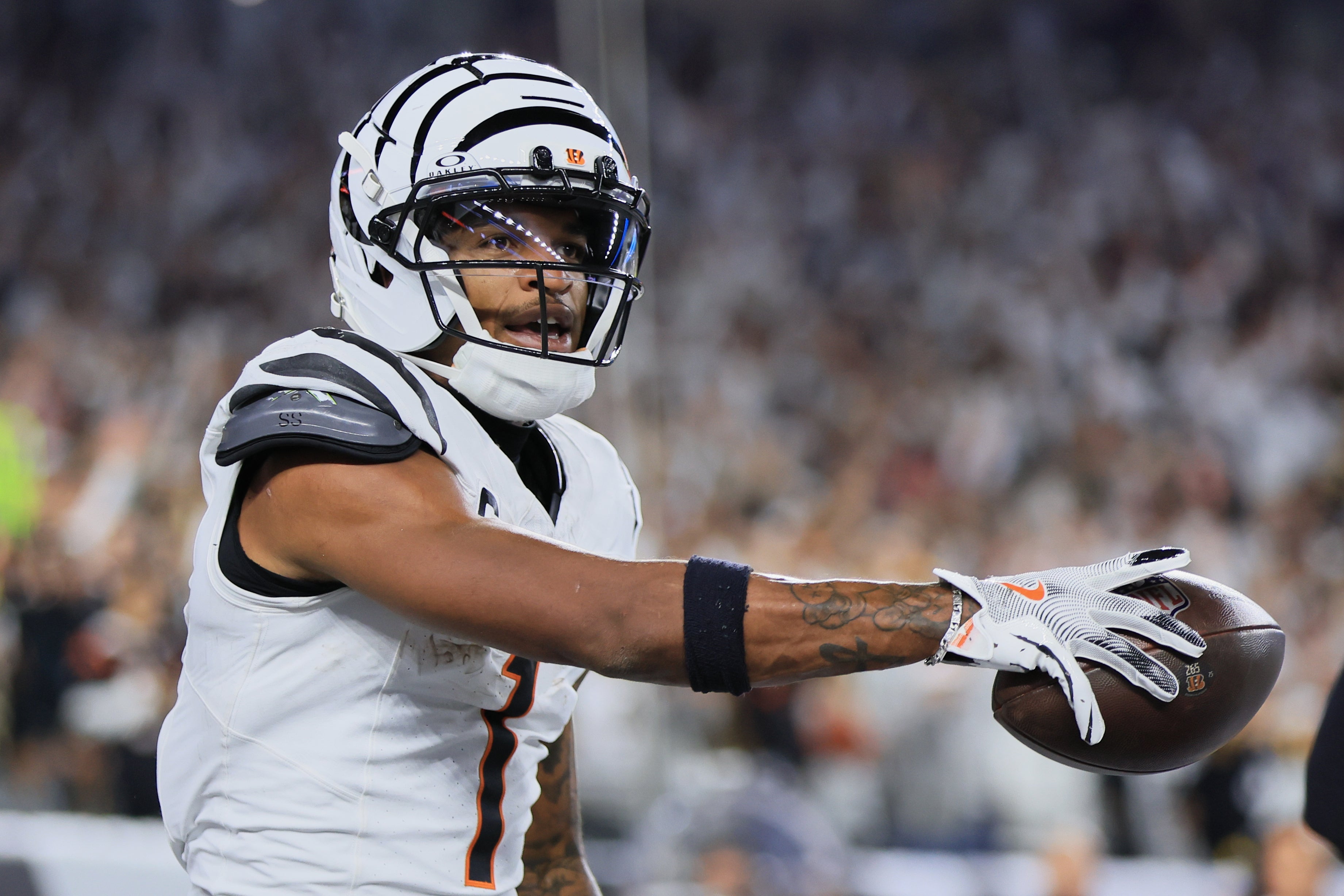 Oct 16, 2025; Cincinnati, Ohio, USA; Cincinnati Bengals wide receiver Ja'Marr Chase (1) reacts after catching a touchdown pass thrown by quarterback Joe Flacco (16) (not pictured) against the Pittsburgh Steelers during the second quarter at Paycor Stadium.