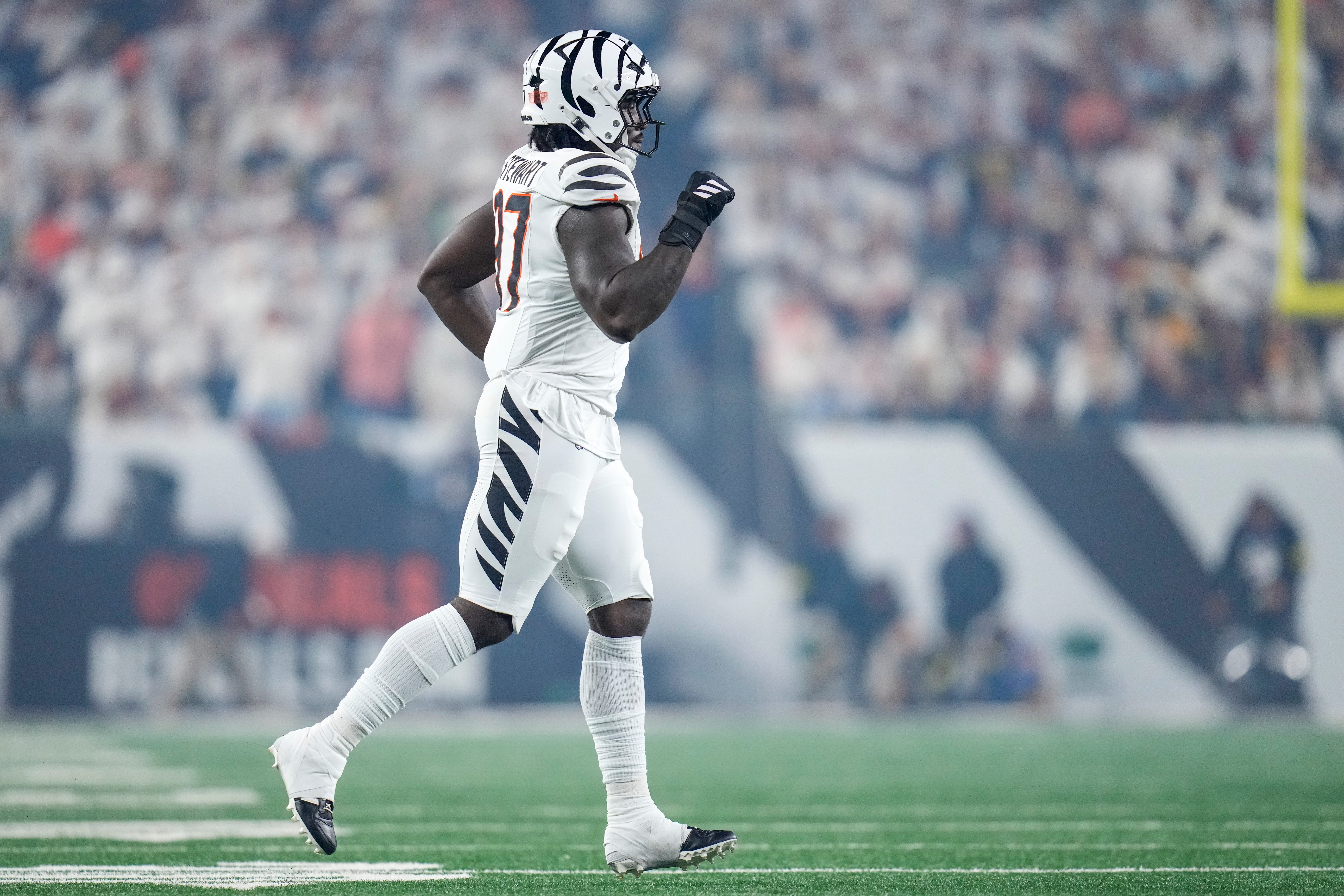 Cincinnati Bengals defensive end Shemar Stewart (97) runs on the field in the fourth quarter of the NFL Week 7 game between the Cincinnati Bengals and the Pittsburgh Steelers at Paycor Stadium in downtown Cincinnati on Thursday, Oct. 16, 2025. The Bengals won, 33-31.