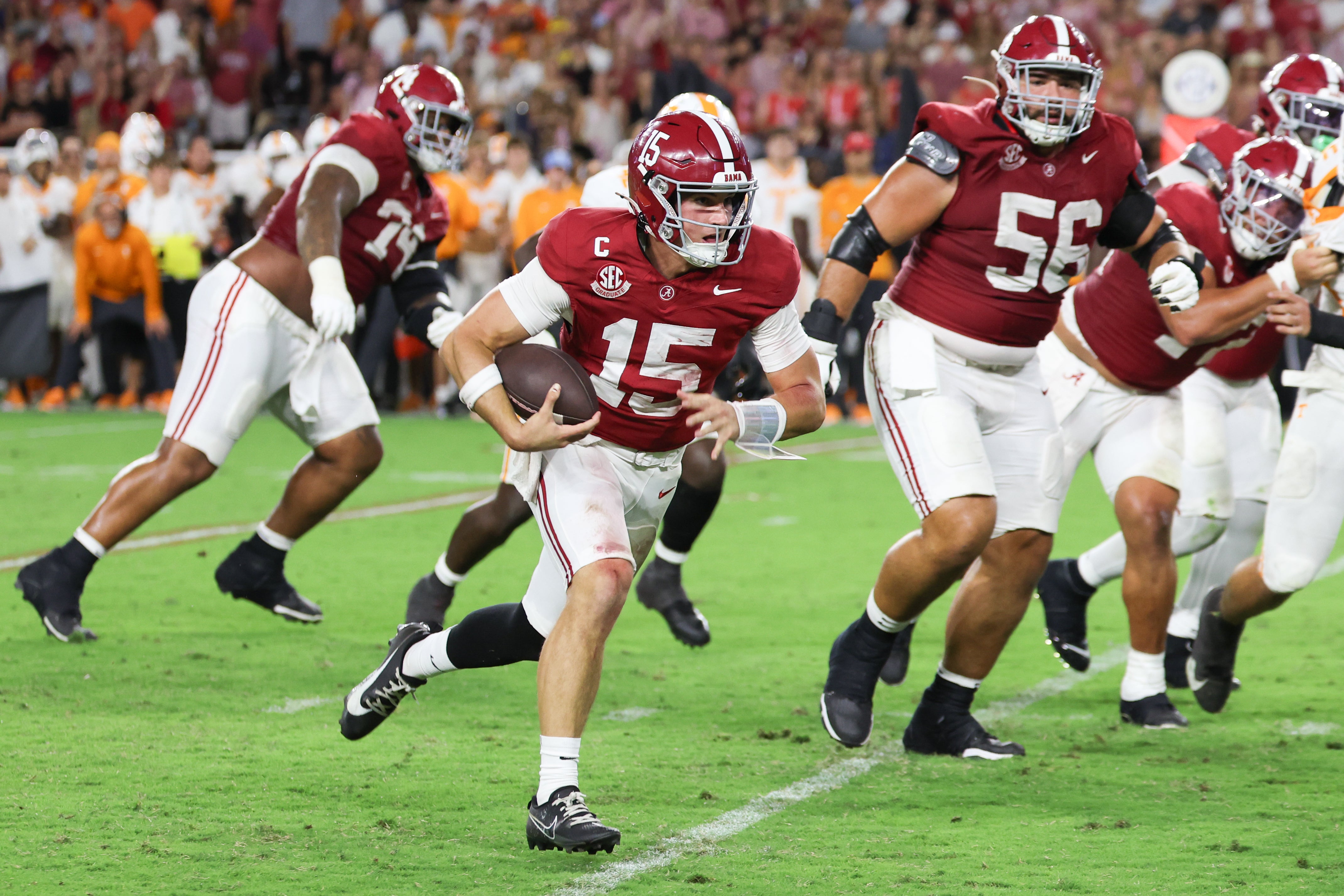 Oct 18, 2025; Tuscaloosa, Alabama, USA; Alabama Crimson Tide quarterback Ty Simpson (15) runs with the ball during the fourth quarter against the Tennessee Volunteers at Saban Field at Bryant-Denny Stadium.