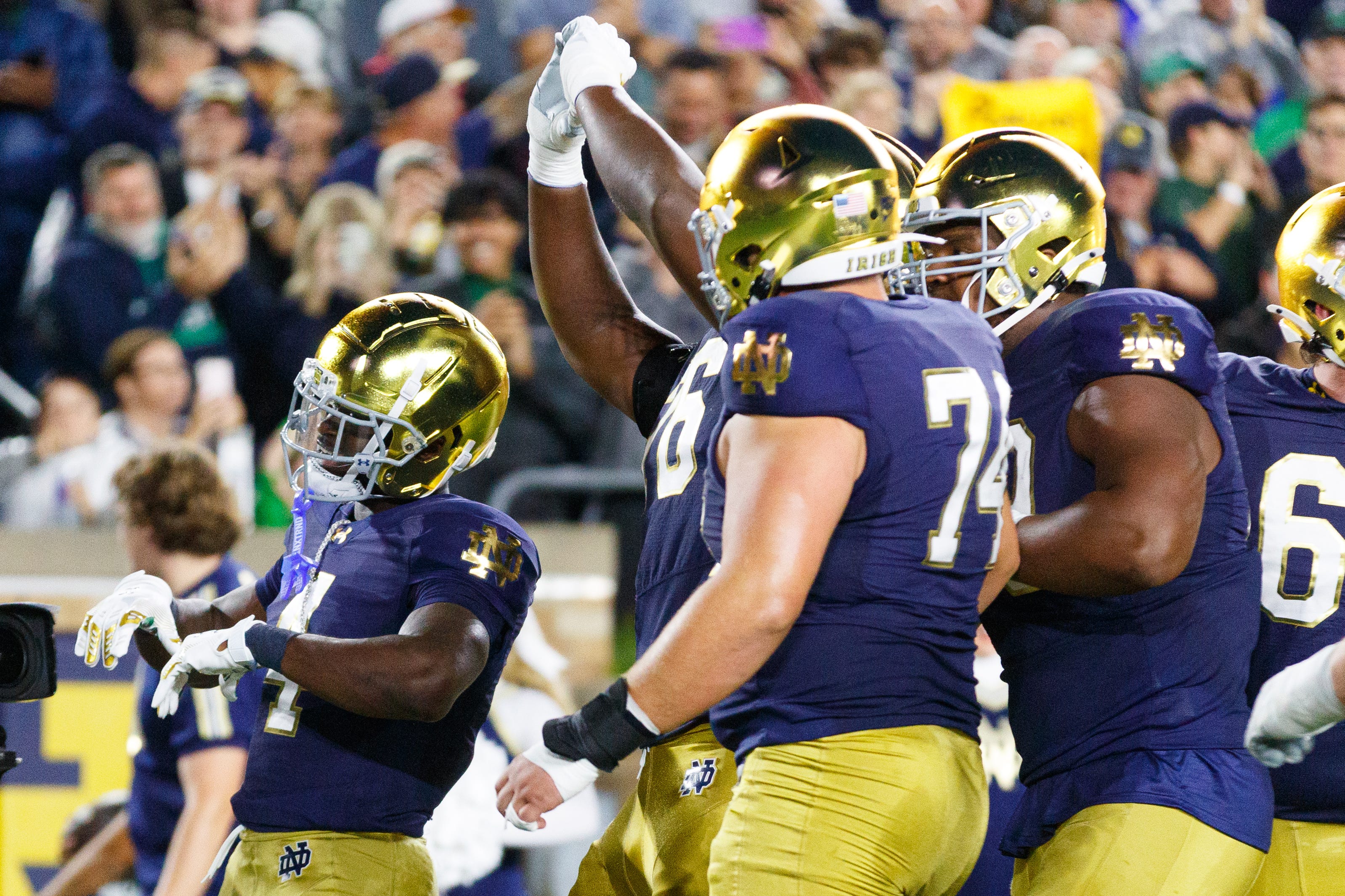 Notre Dame running back Jeremiyah Love, left, celebrates after scoring a touchdown in the first half of a NCAA football game against Southern California at Notre Dame Stadium on Saturday, Oct. 18, 2025, in South Bend.