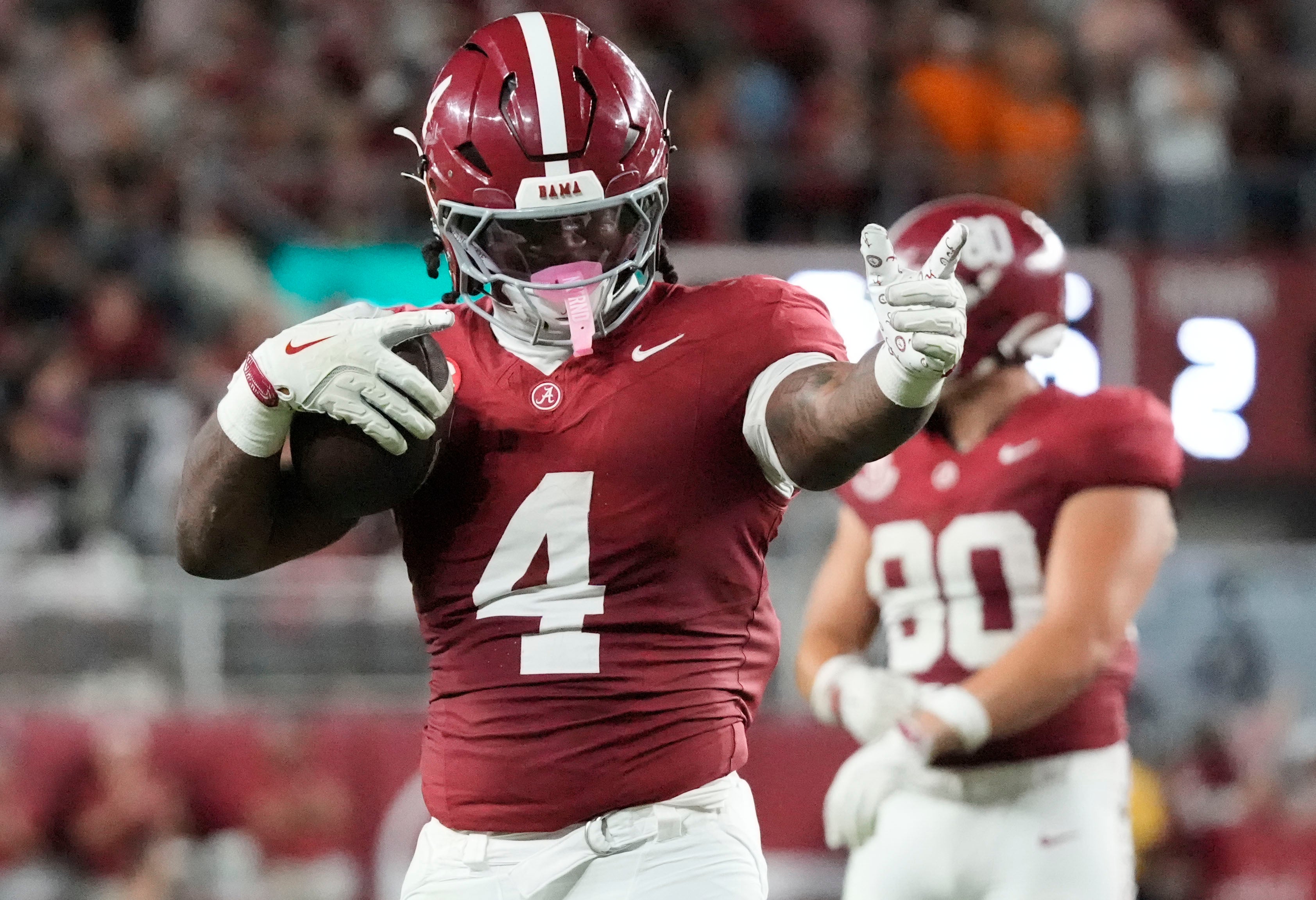 Oct 18, 2025; Tuscaloosa, Alabama, USA; Alabama Crimson Tide running back Daniel Hill (4) celebrates a play in the second half against the Tennessee Volunteers at Saban Field at Bryant-Denny Stadium.
