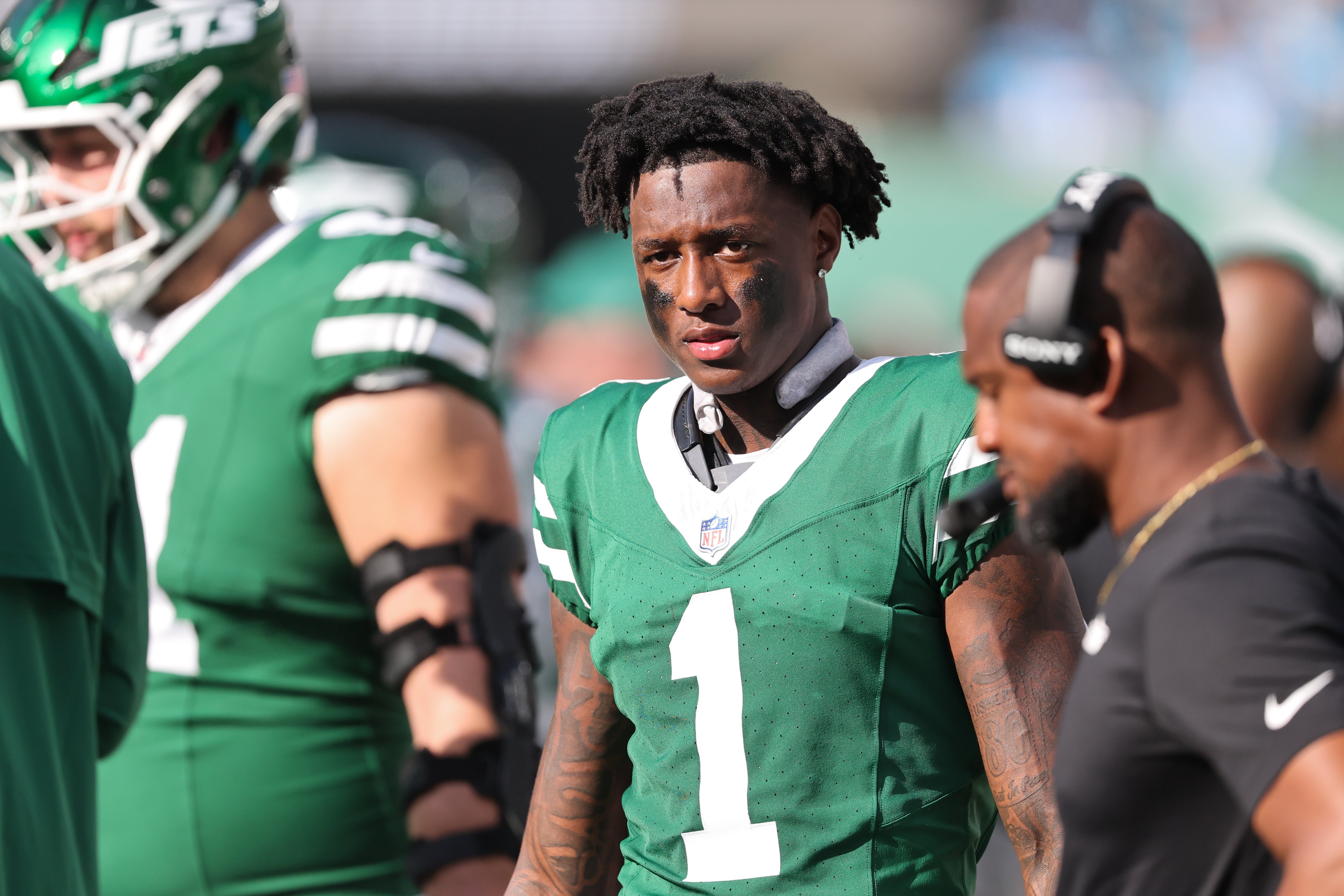 Oct 19, 2025; East Rutherford, New Jersey, USA; New York Jets cornerback Sauce Gardner (1) looks on from the sidelines during the third quarter against the Carolina Panthers at MetLife Stadium.