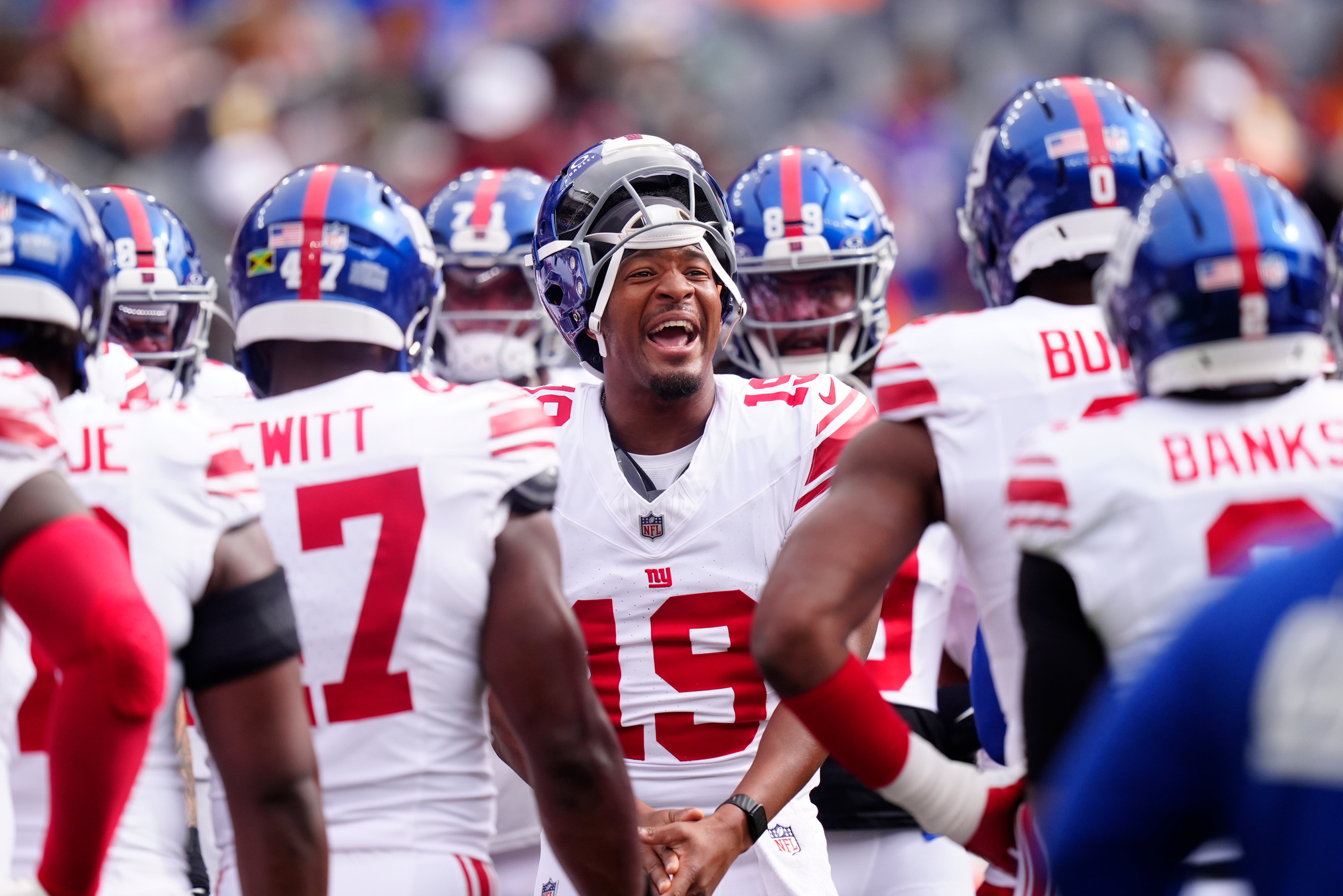 Oct 19, 2025; Denver, Colorado, USA; New York Giants quarterback Jameis Winston (19) huddles up before the game against the Denver Broncos at Empower Field at Mile High.