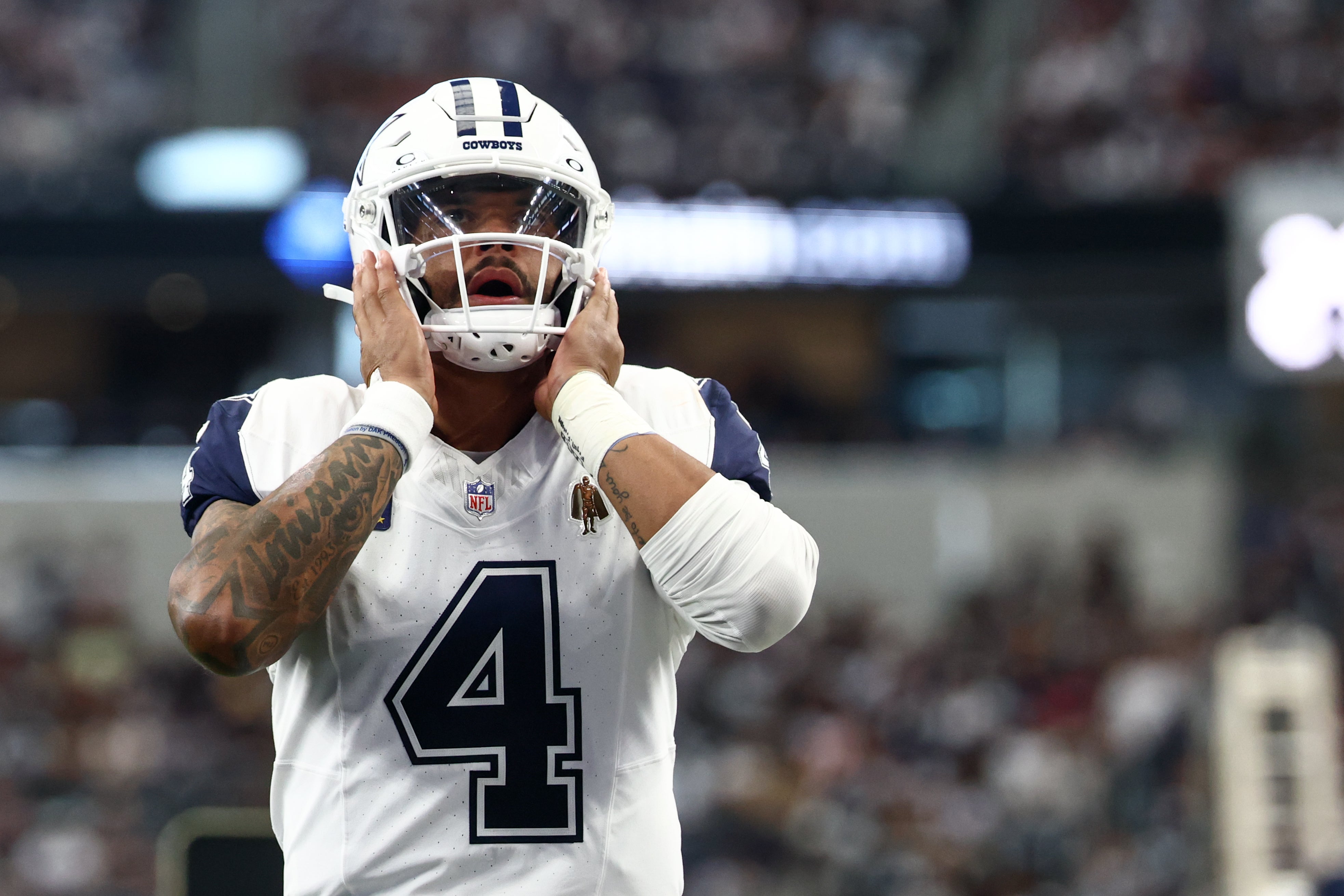 Oct 19, 2025; Arlington, Texas, USA; Dallas Cowboys quarterback Dak Prescott (4) looks on prior to the game against the Washington Commanders at AT&T Stadium.