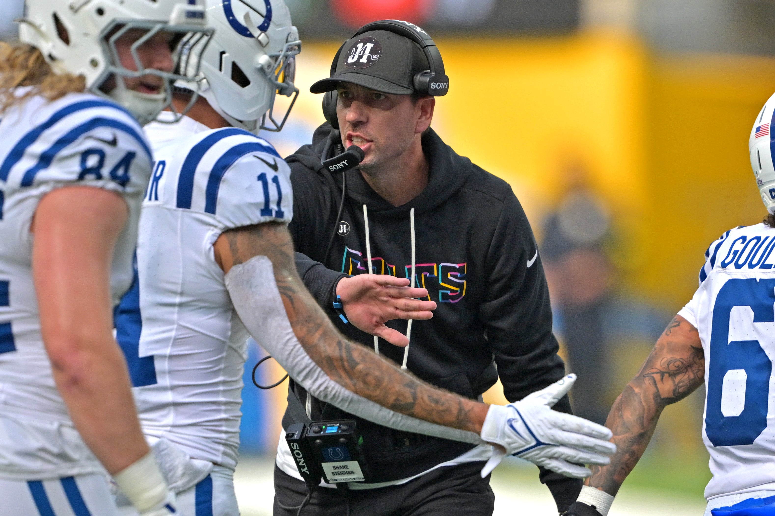 Colts Shane Steichen greets players on the sideline