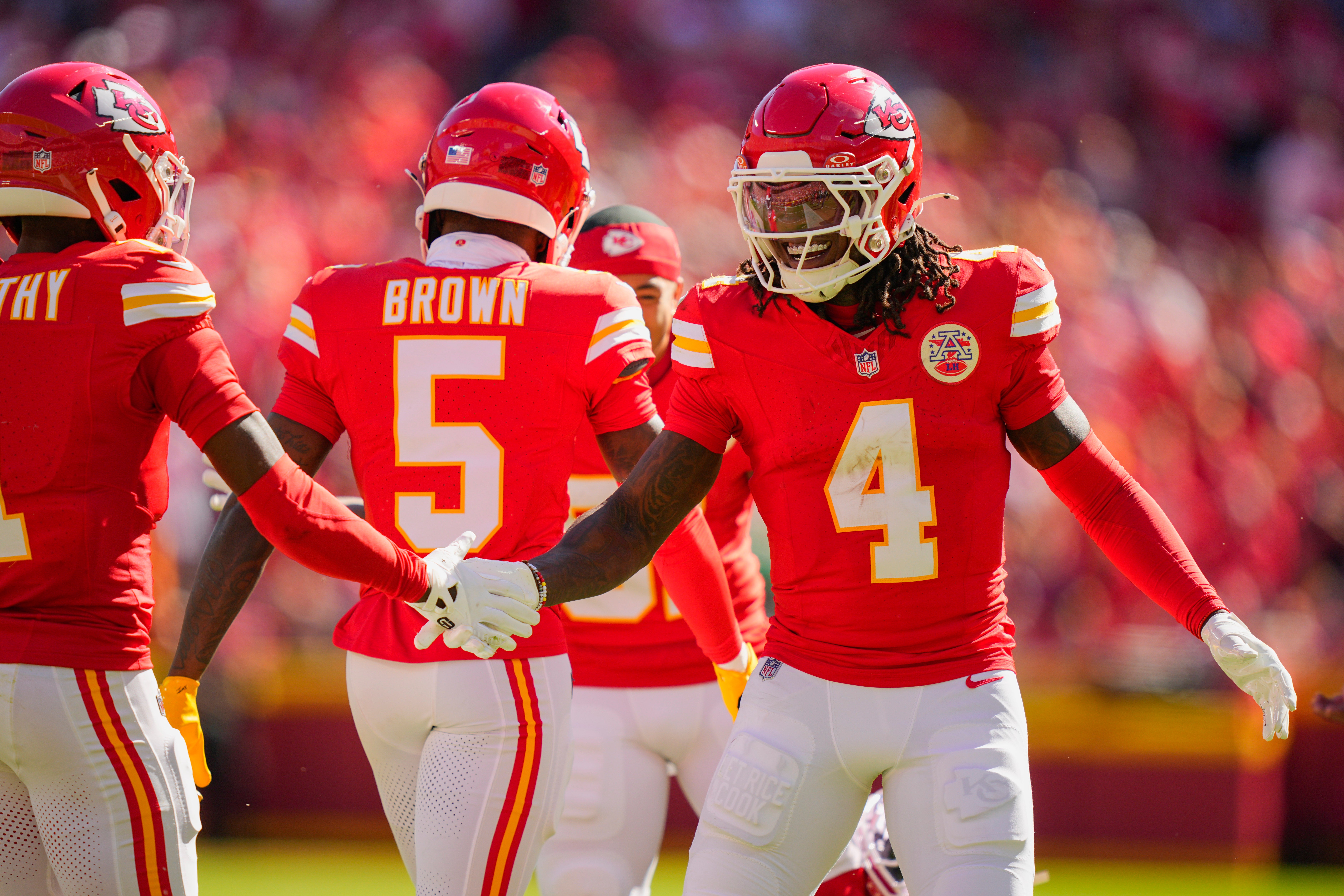 Kansas City Chiefs wide receiver Rashee Rice (4) celebrates with wide receiver Xavier Worthy (1) after a touchdown