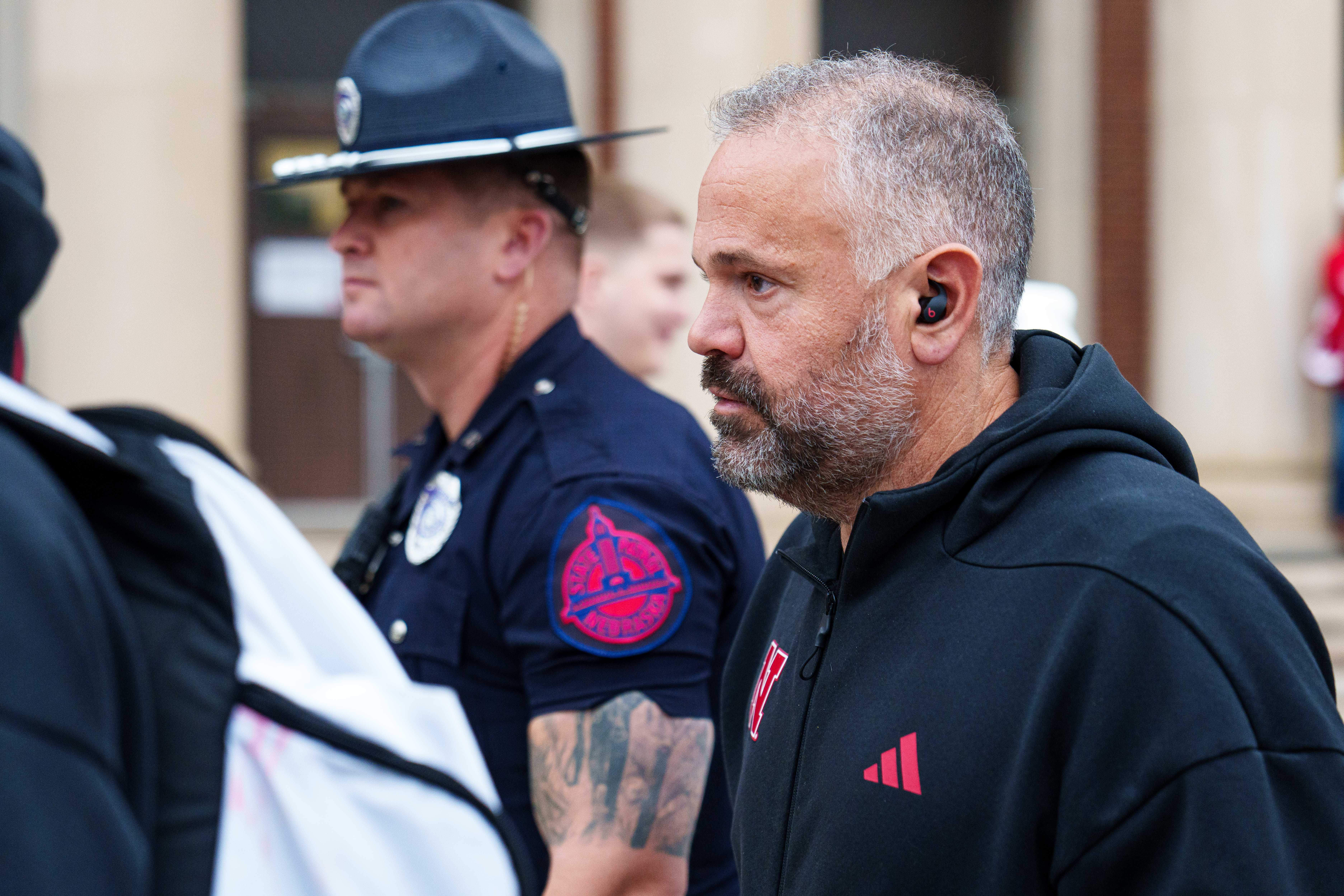 Oct 25, 2025; Lincoln, Nebraska, USA; Nebraska Cornhuskers head coach Matt Rhule arrives before the game against the Northwestern Wildcats at Memorial Stadium. Mandatory Credit: Dylan Widger-Imagn Images