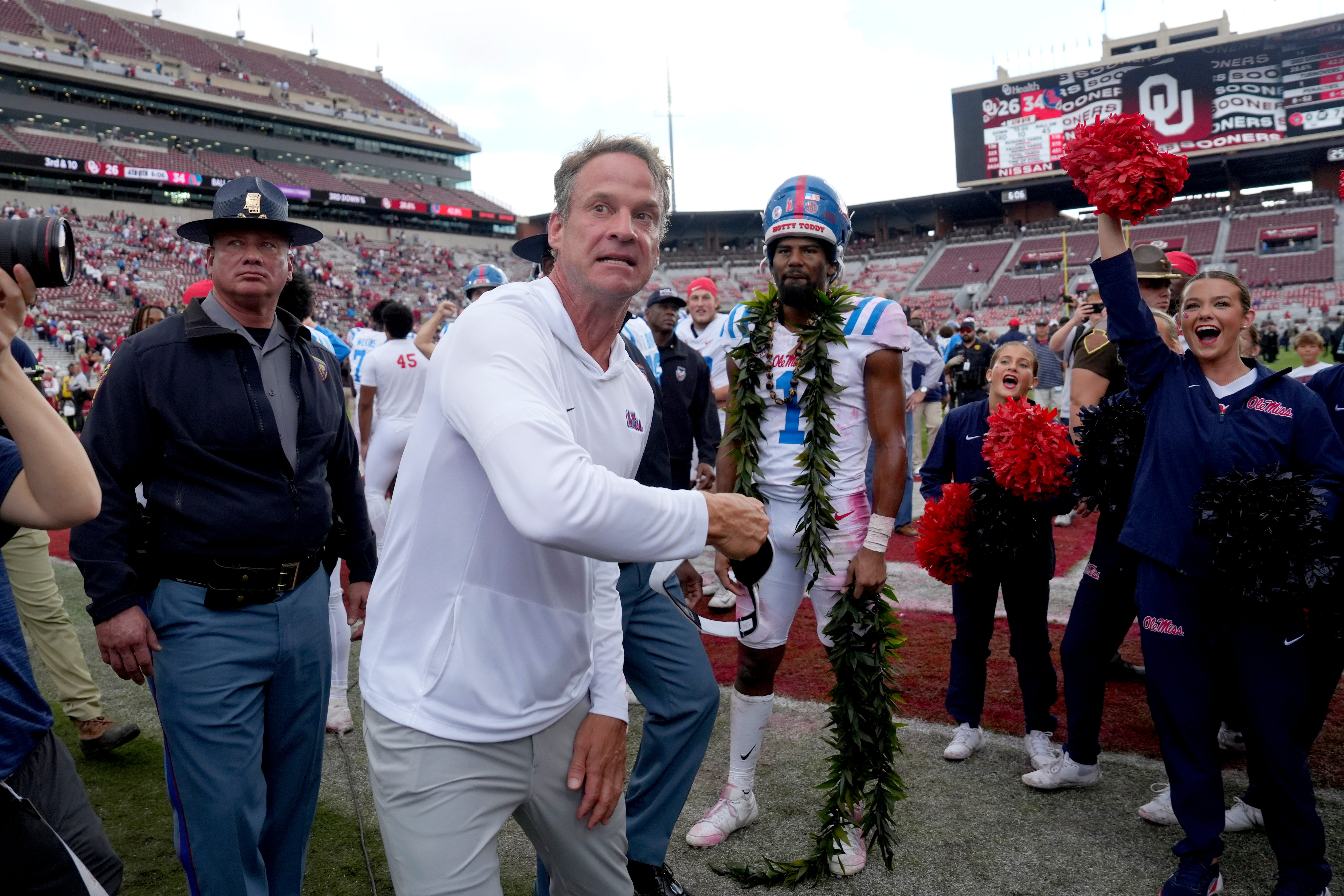 Ole Miss coach Lane Kiffin throws his visor into the stands after a college football game between the University of Oklahoma Sooners (OU) and the Ole Miss Rebels at Gaylord Family Ð Oklahoma Memorial Stadium in Norman, Okla., Saturday, Oct. 25, 2025. Ole Miss won 34-26.