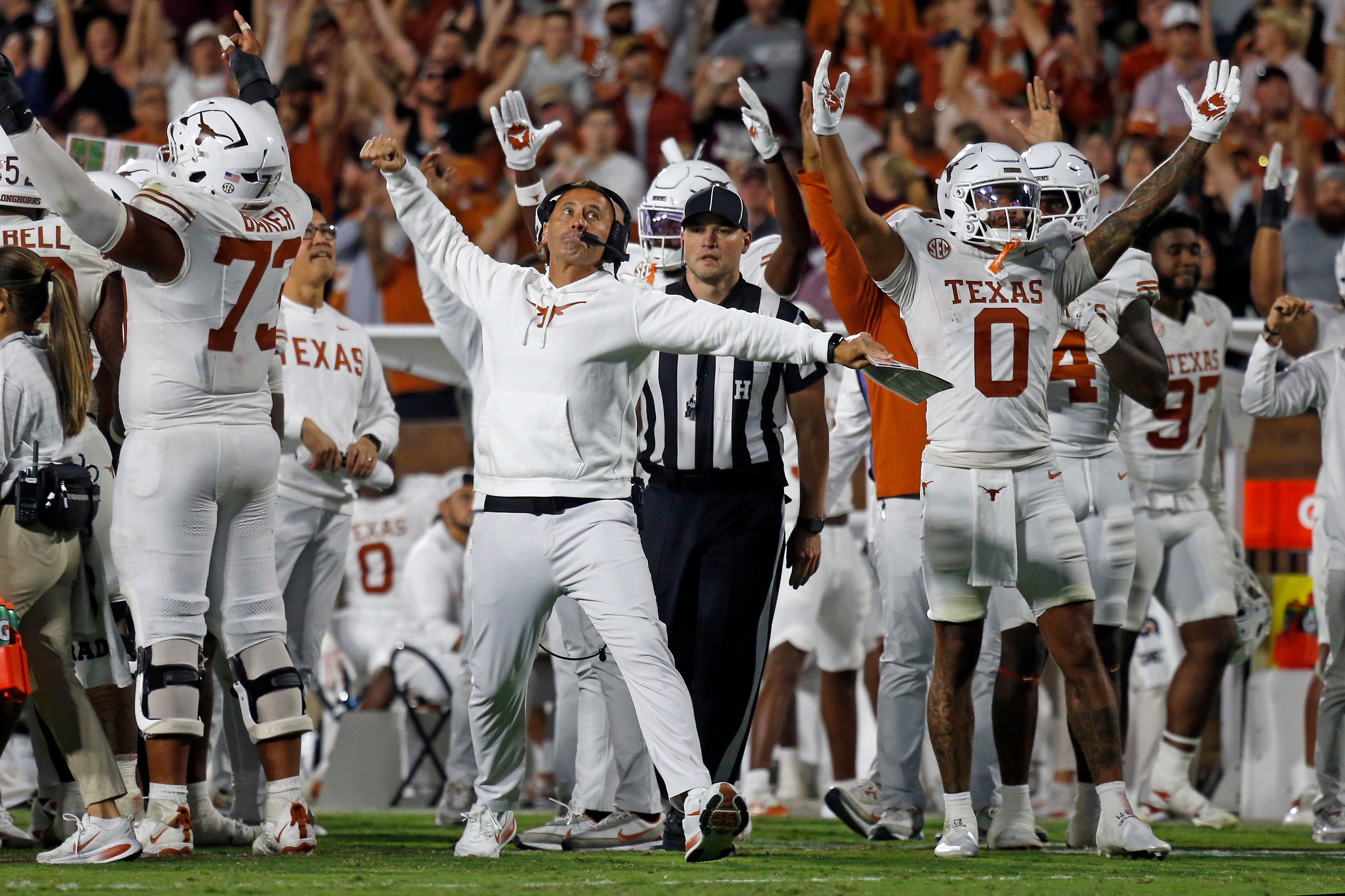 Oct 25, 2025; Starkville, Mississippi, USA; Texas Longhorns head coach Steve Sarkisian reacts after a touchdown during overtime against the Mississippi State Bulldogs at Davis Wade Stadium at Scott Field. Mandatory Credit: Petre Thomas-Imagn Images
