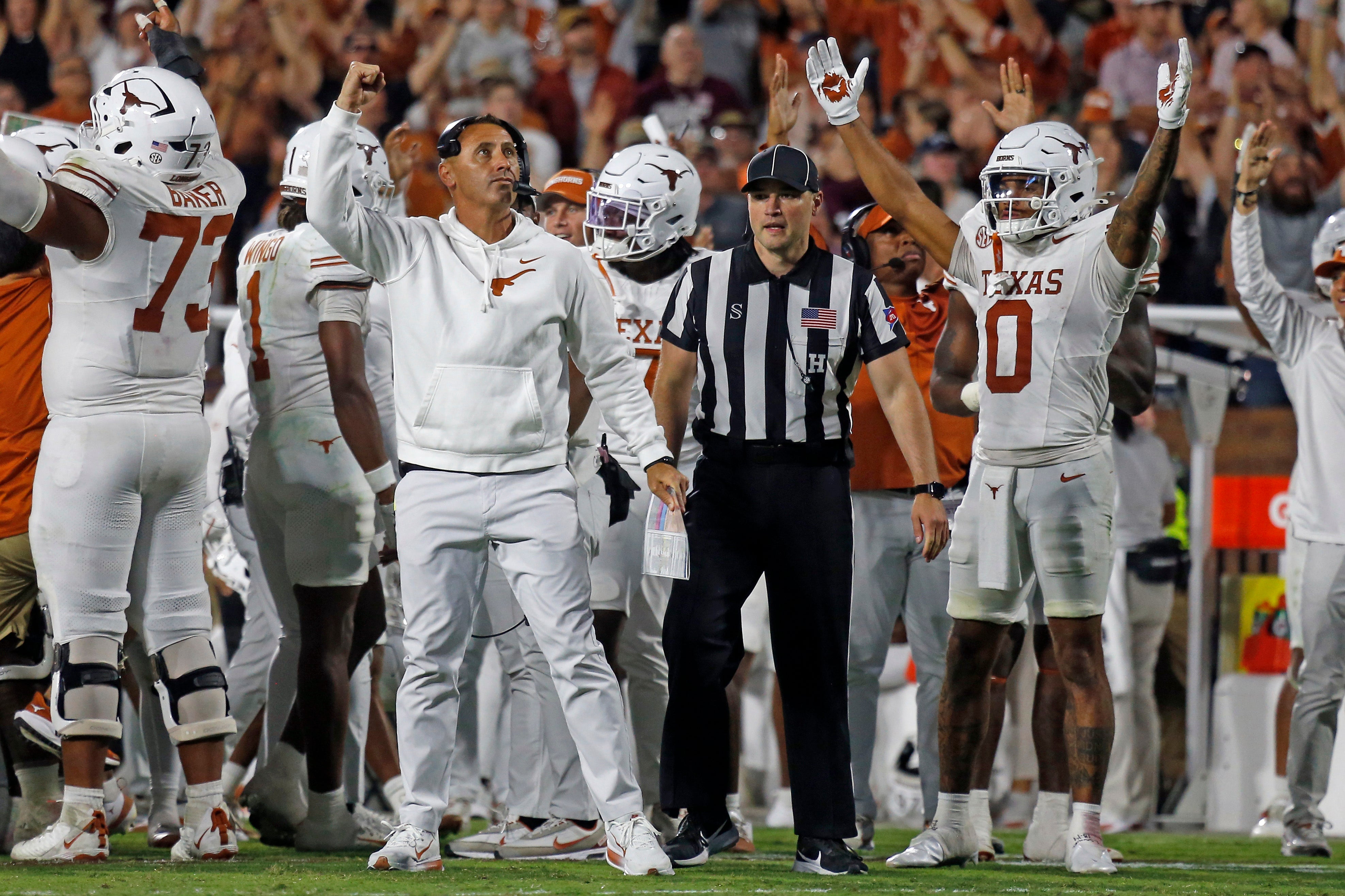 Oct 25, 2025; Starkville, Mississippi, USA; Texas Longhorns head coach Steve Sarkisian reacts after a touchdown during overtime against the Mississippi State Bulldogs at Davis Wade Stadium at Scott Field. Mandatory Credit: Petre Thomas-Imagn Images