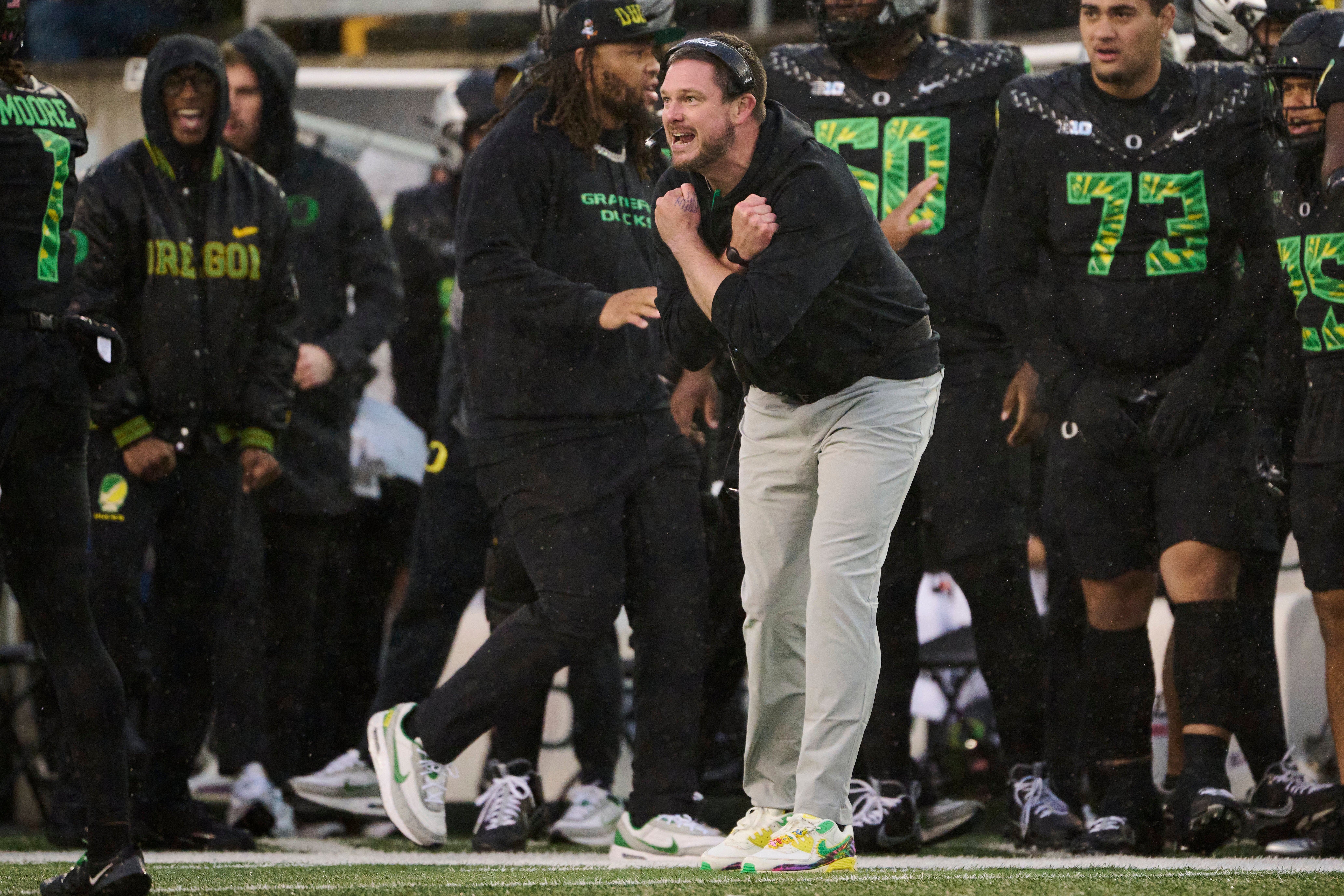 Oct 25, 2025; Eugene, Oregon, USA; Oregon Ducks head coach Dan Lanning instructs players during the first half against the Wisconsin Badgers at Autzen Stadium. Mandatory Credit: Troy Wayrynen-Imagn Images