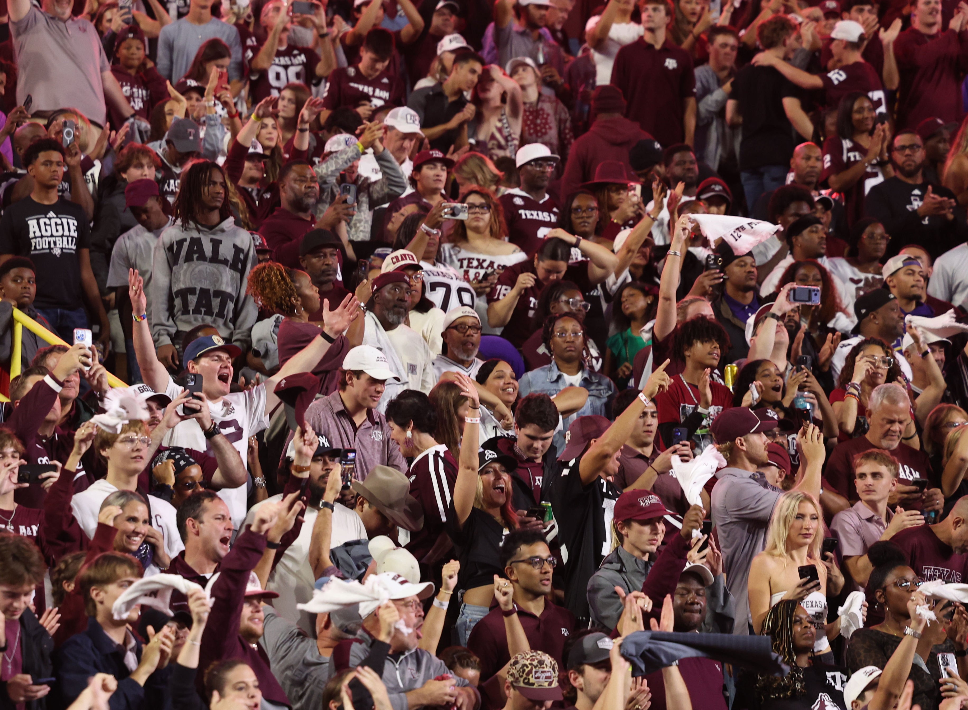Oct 25, 2025; Baton Rouge, Louisiana, USA; Texas A&M Aggies fans celebrate after defeating the Louisiana State Tigers at Tiger Stadium.